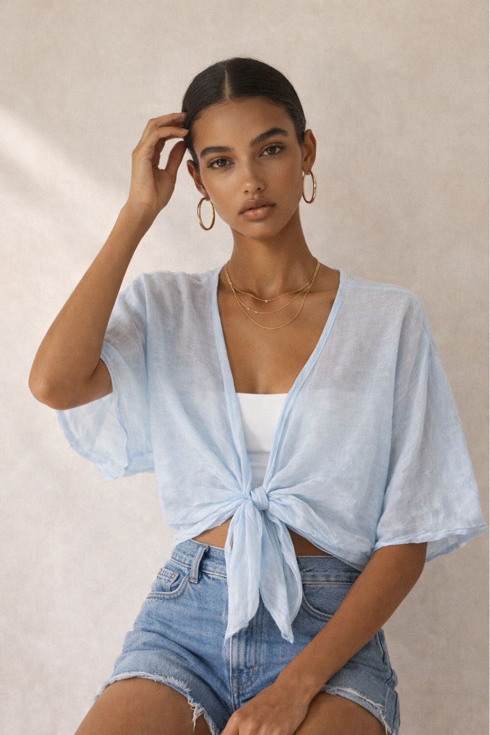 Grossiste WAY WAY SRL - Blouse en Tencel avec décolleté plongeant et nœud frontal