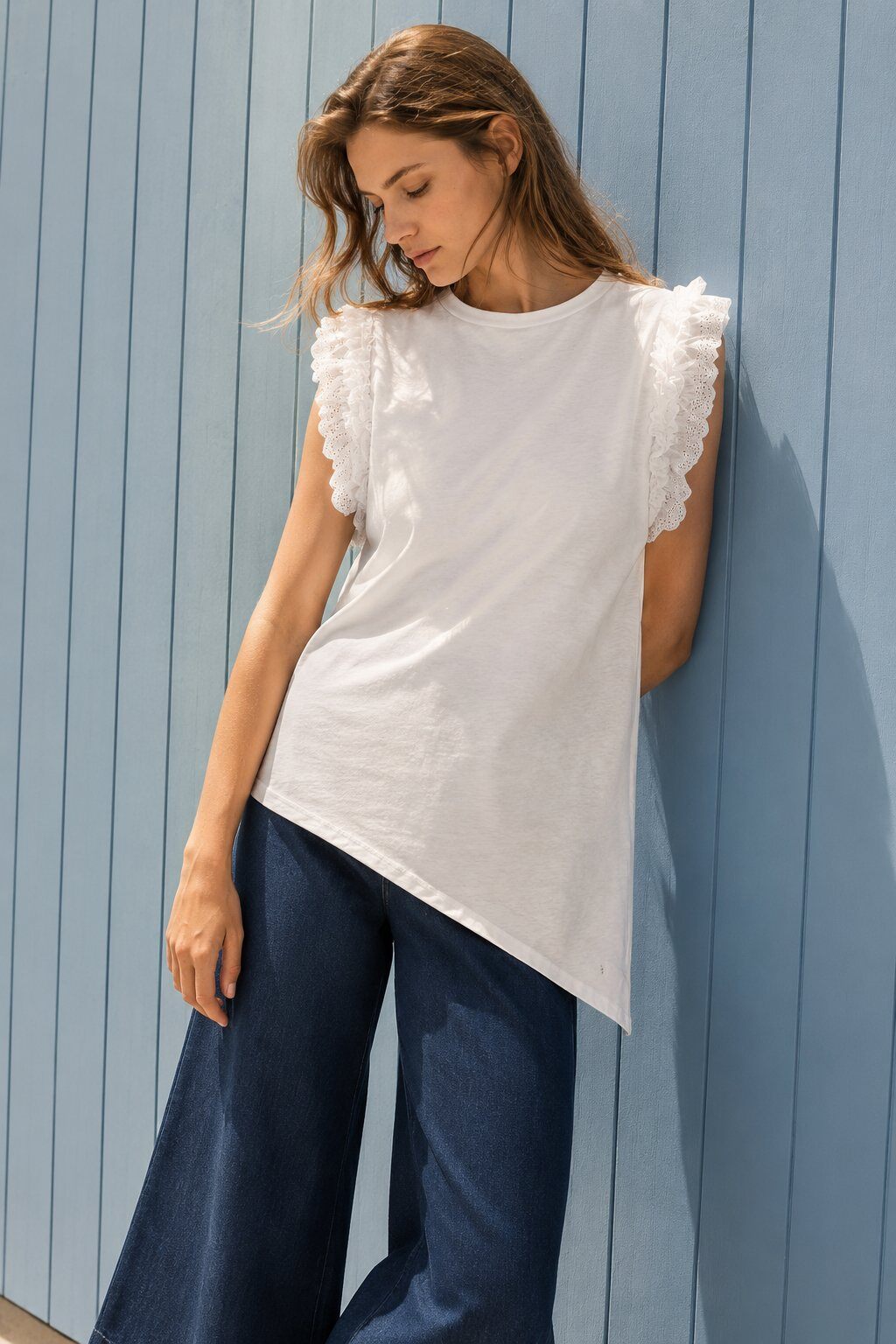Wholesaler WAY WAY SRL - COTTON T-SHIRT WITH EYELET RUFFLES AND ASYMMETRICAL HEM