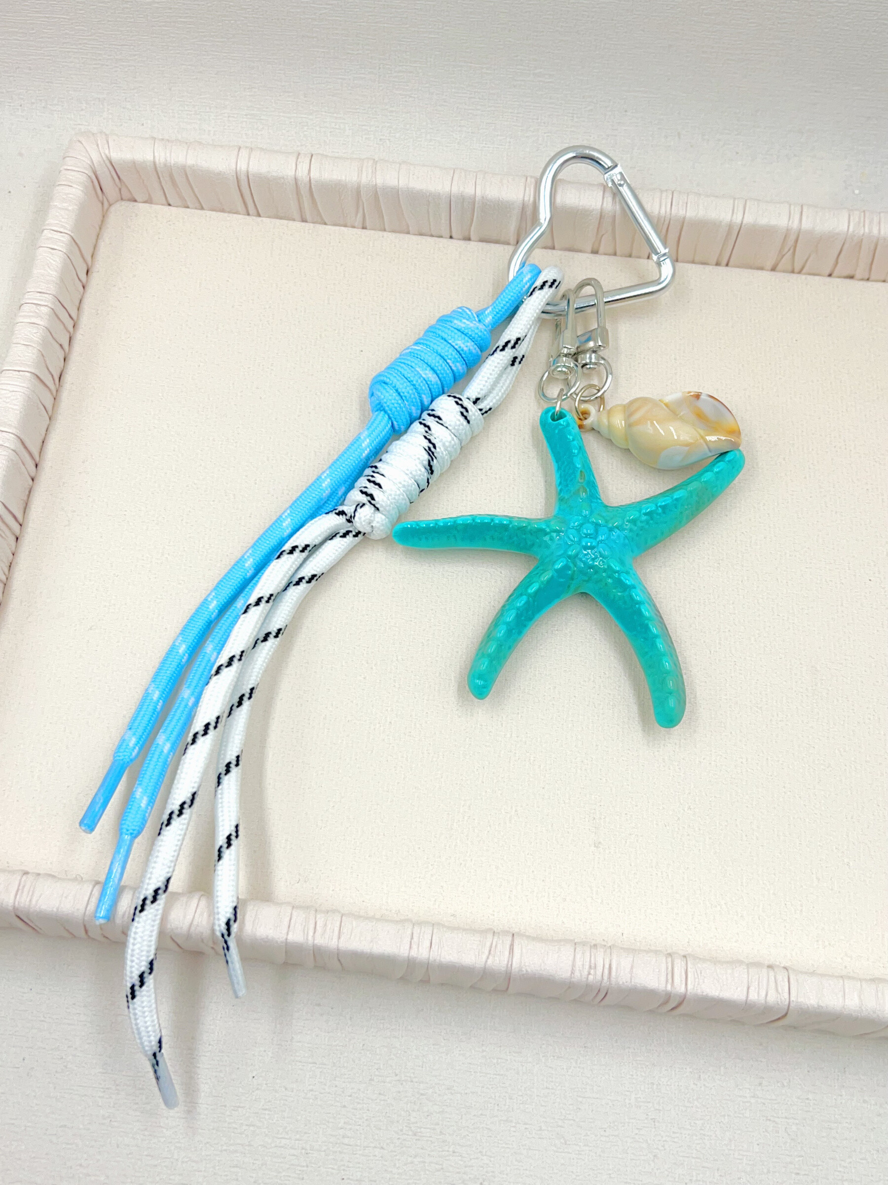 Grossista WEC Bijoux - Porta chiave di etoile de mer