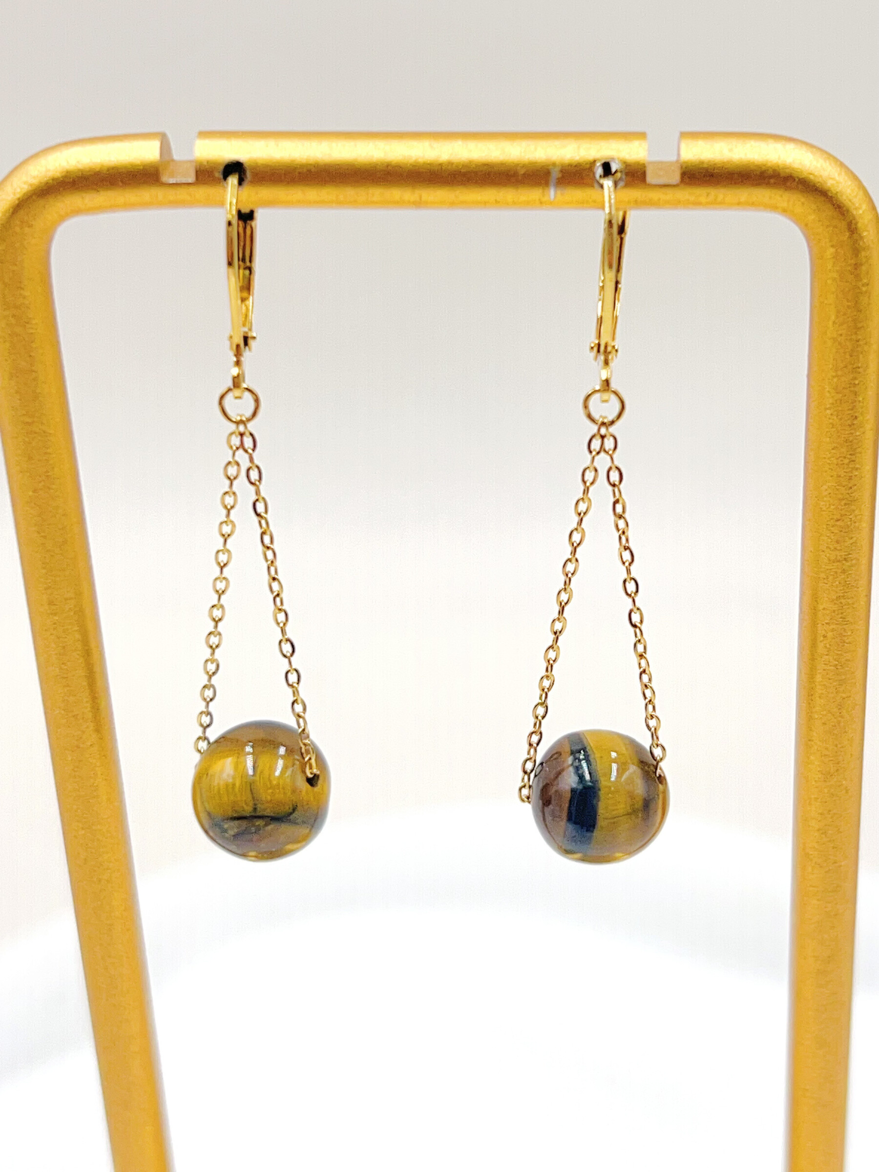 Grossiste WEC Bijoux - BOUCLE D' OREILLES EN ACIER INOXYDABLE + OEIL DE TIGRE