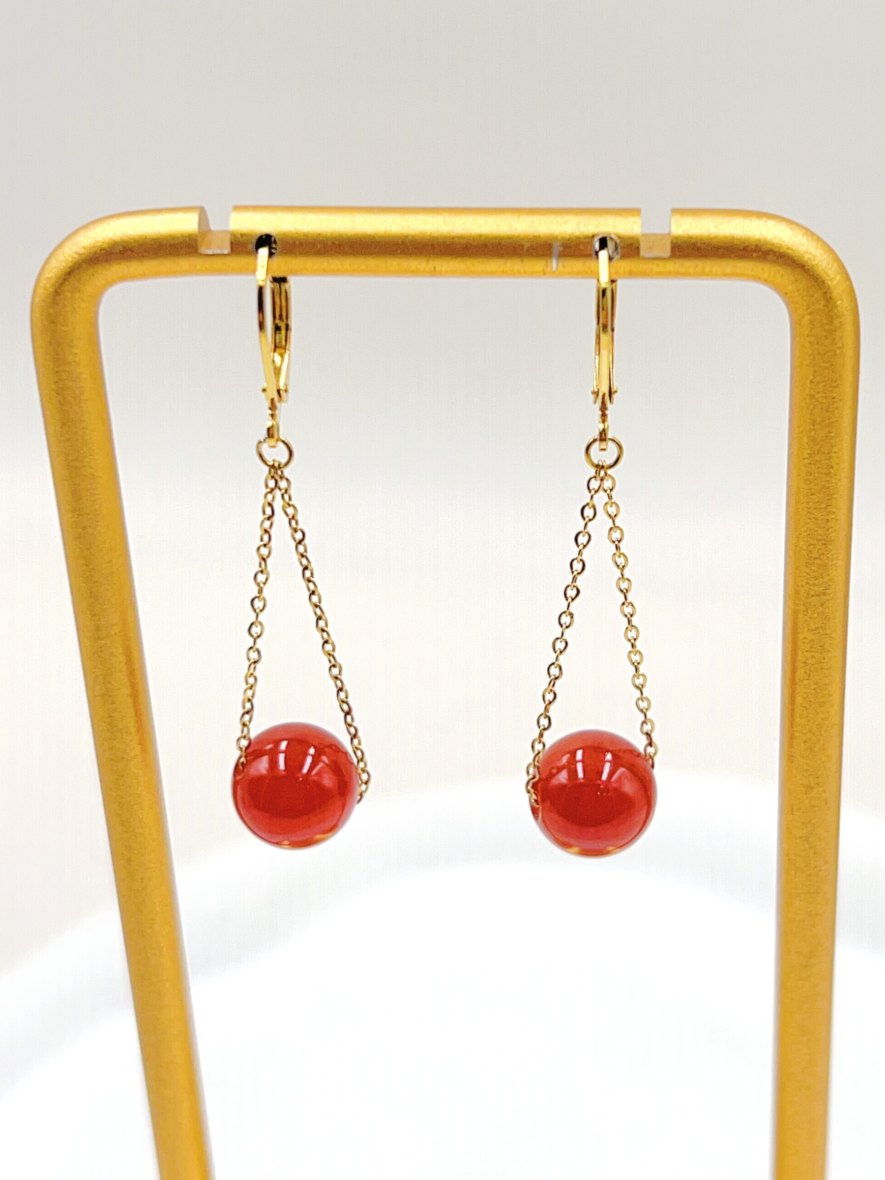 Grossiste WEC Bijoux - BOUCLE D' OREILLES EN ACIER INOXYDABLE + PIERRE AGATE ROUGE