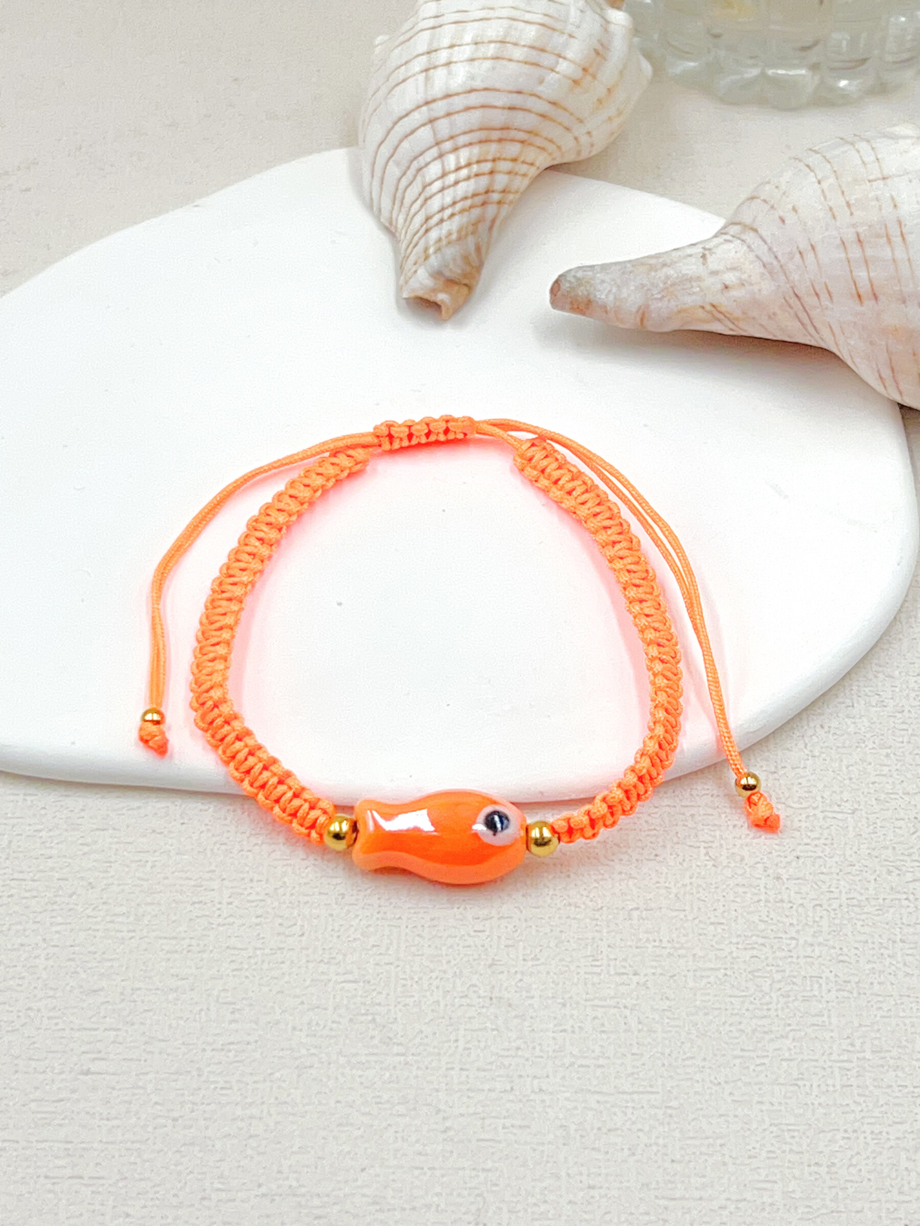 Mayorista WEC Bijoux - Pulsera de peces cerámicos, cordón