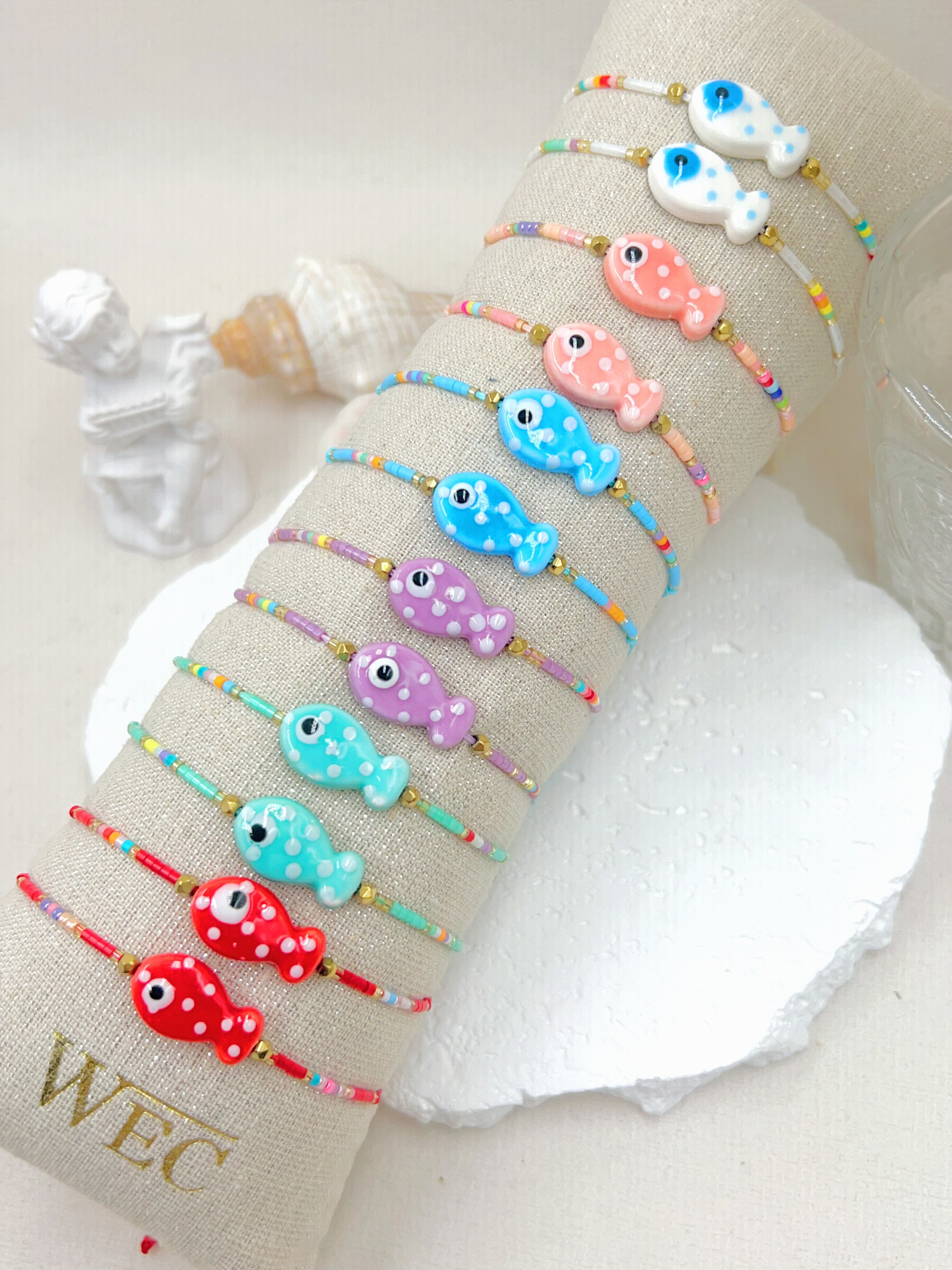 Mayorista WEC Bijoux - Conjunto de 12 brazalete de cerámica, acero y perla+salchicha