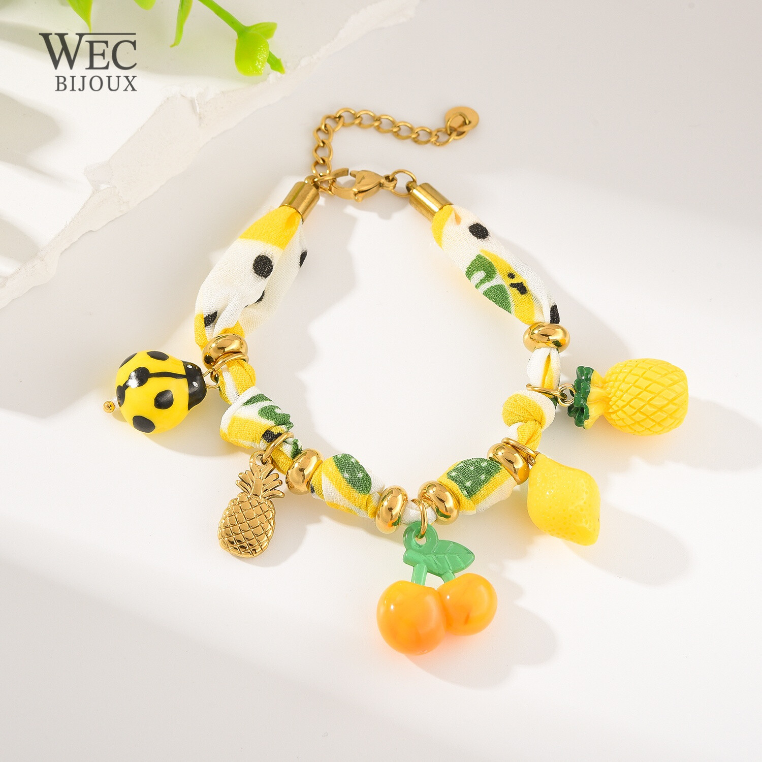 Grossista WEC Bijoux - Bracciale al limone in acciaio inossidabile, tessuto e fascino