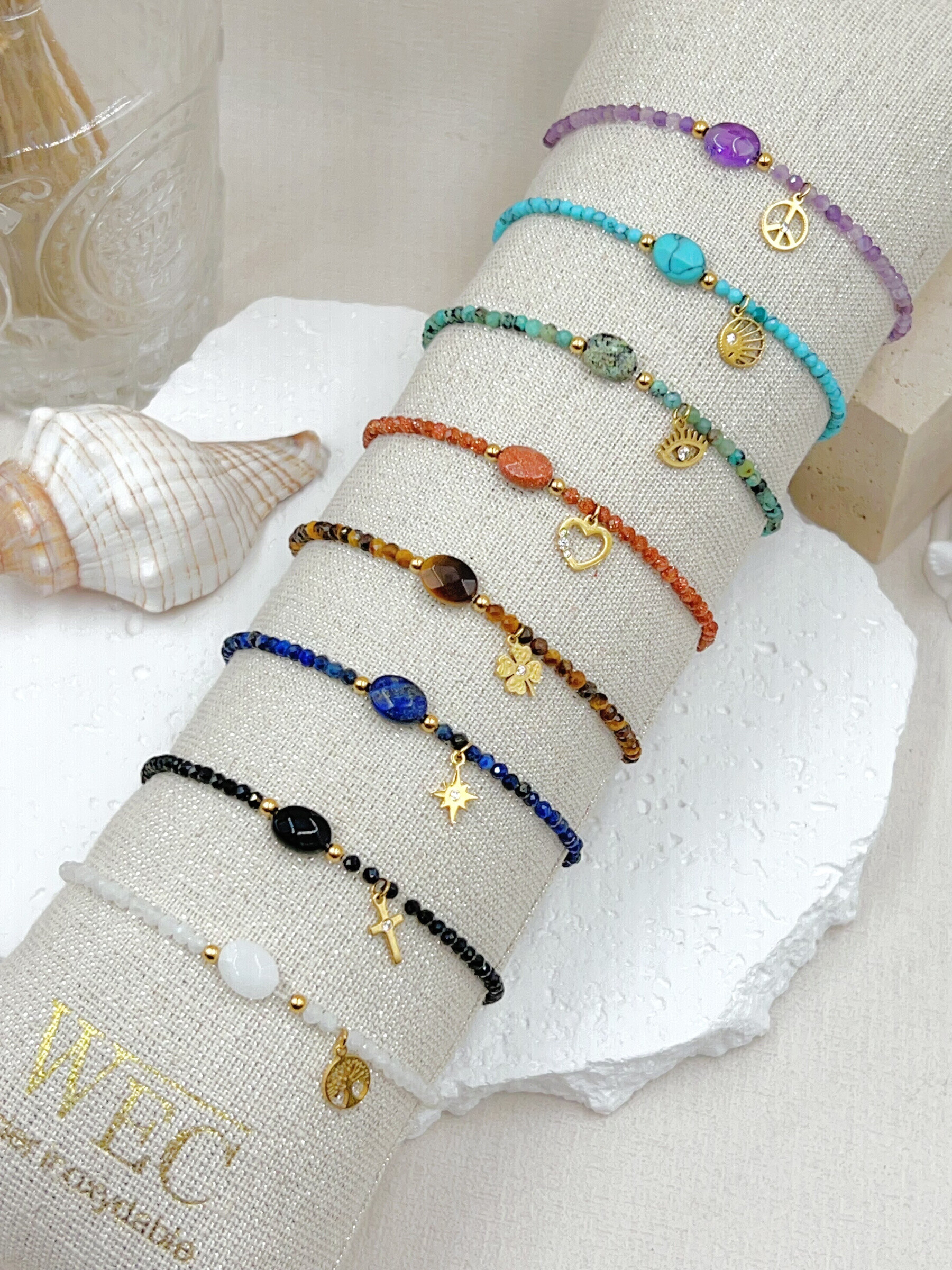 Großhändler WEC BIJOUX - SET AUS 8 EDELSTAHLARMBÄNDERN+BUDDIN