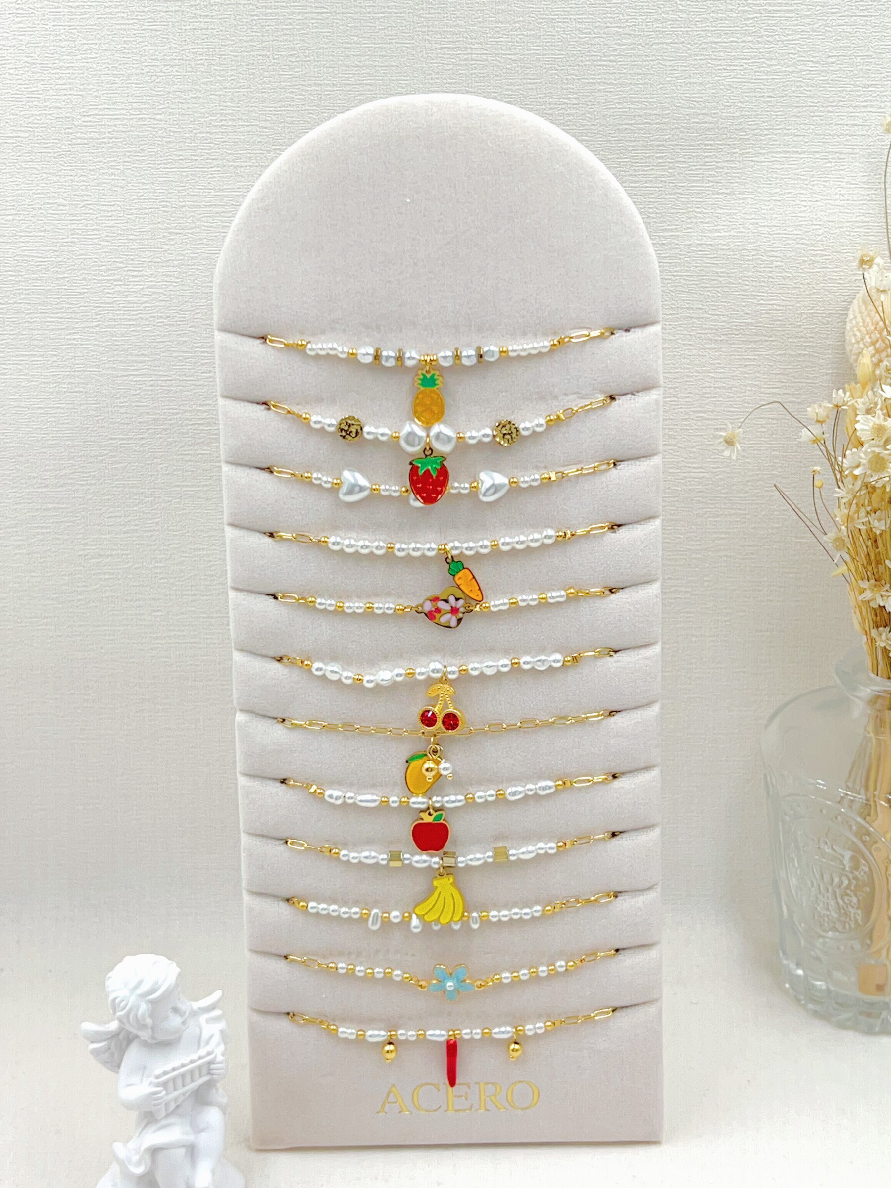Grossista WEC Bijoux - Set di 12 bracciale in acciaio inossidabile + presentazione