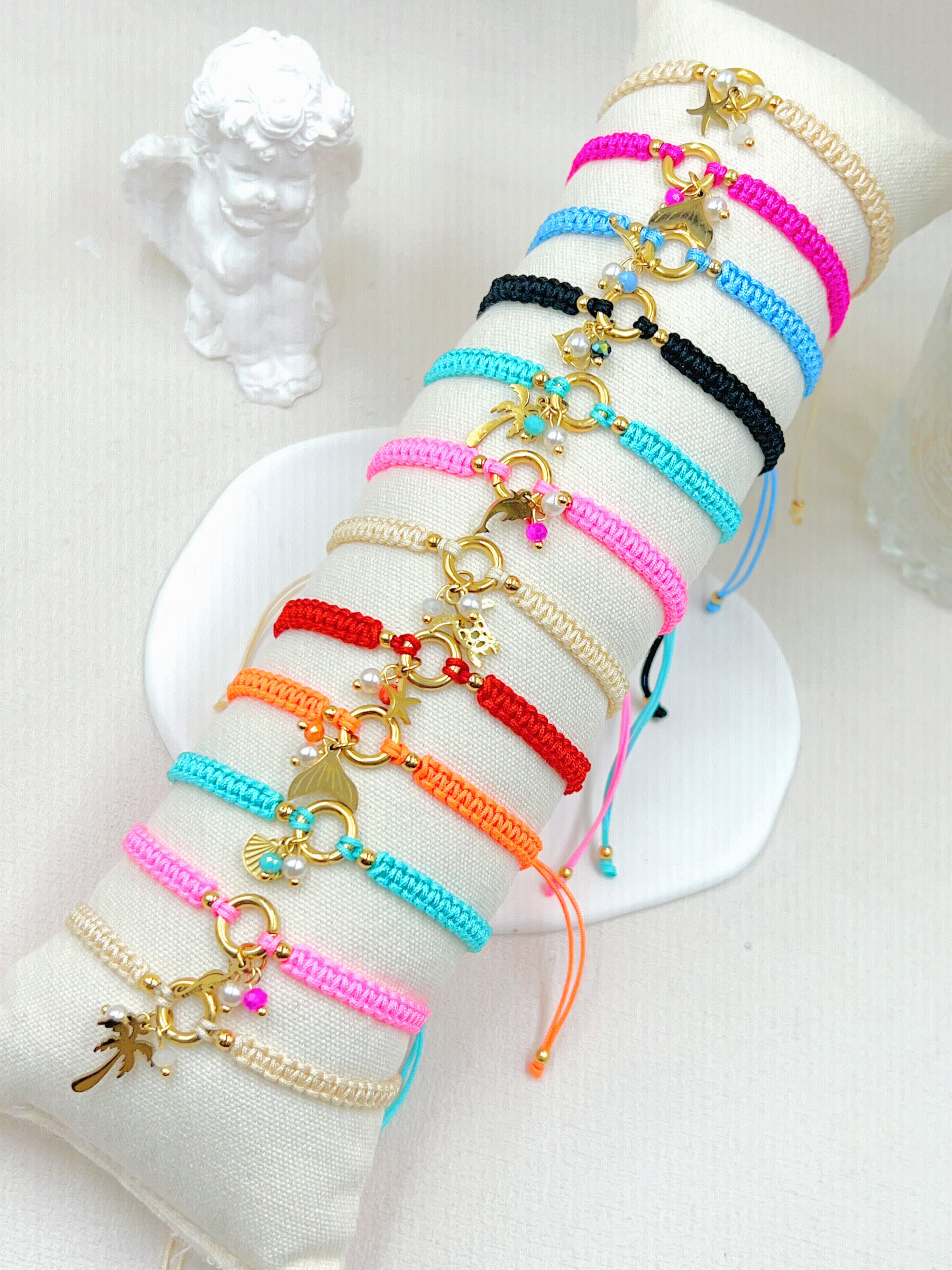 Wholesaler WEC Bijoux - Set of 12 steel bracelets, cord+presenting