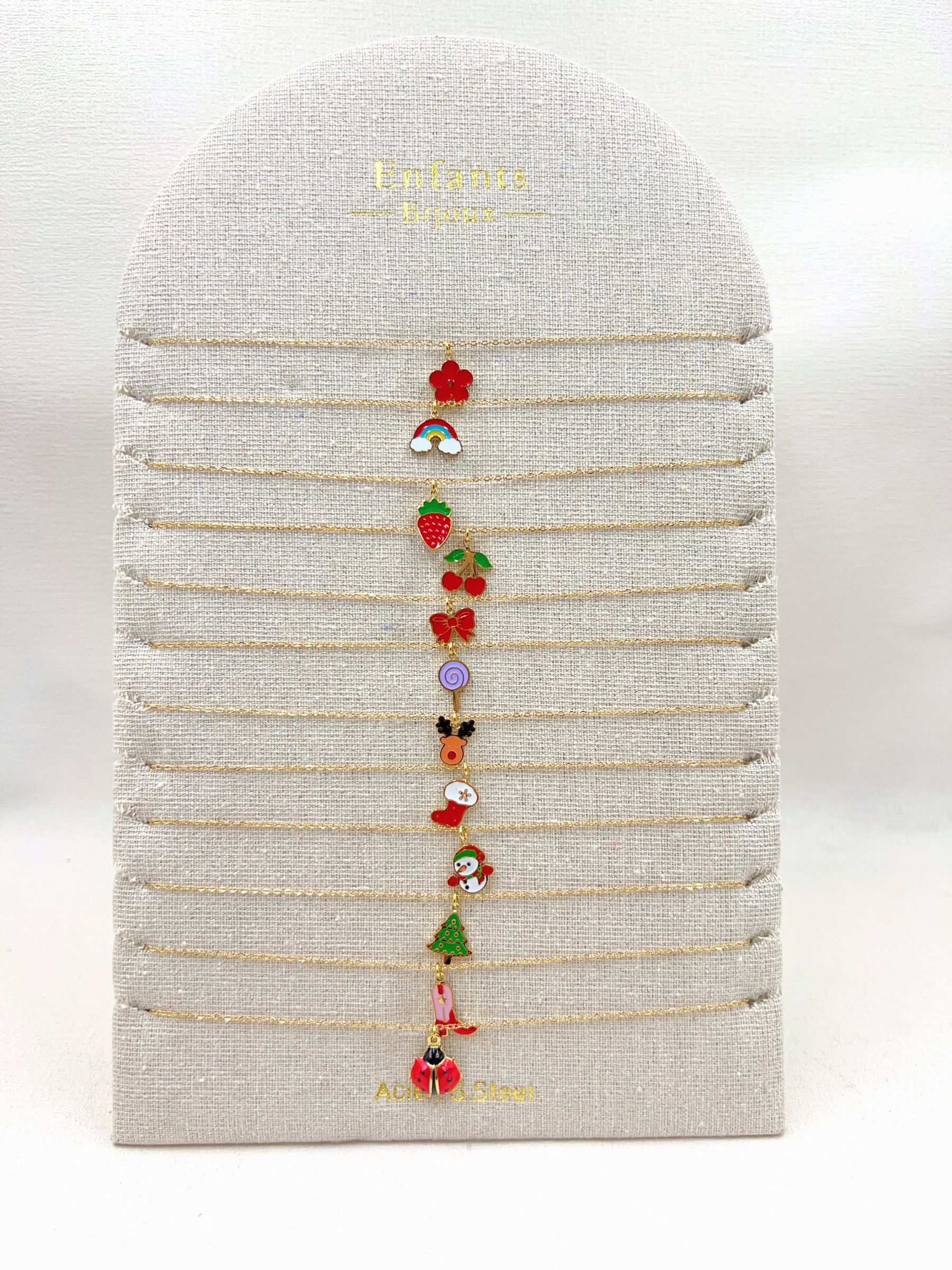 Wholesaler WEC - SET OF 12 STAINLESS STEEL CHILDREN'S NECKLACES +DISPLAY