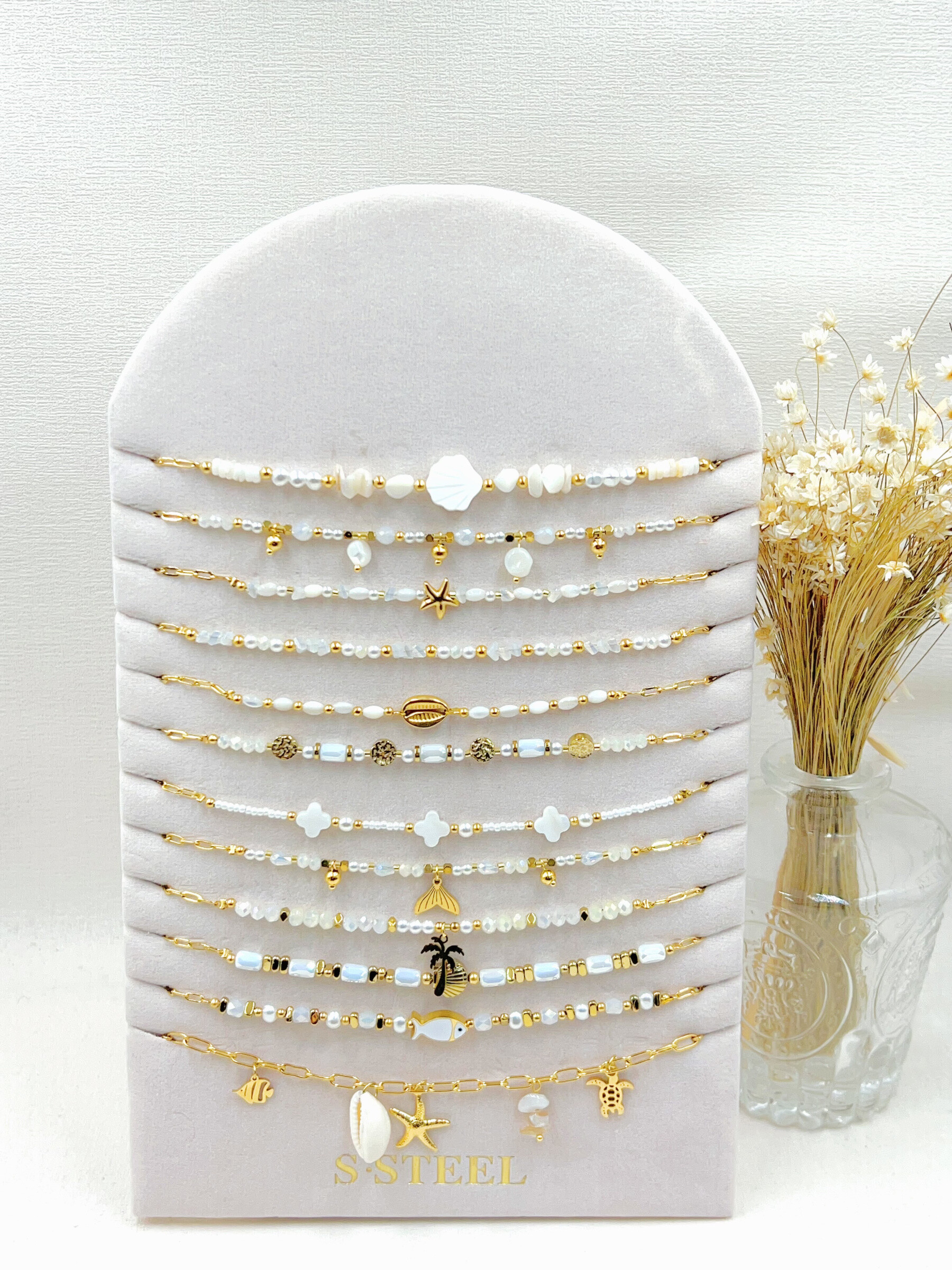 Wholesaler WEC Bijoux - Set of 12 stainless steel necklaces+ presentation