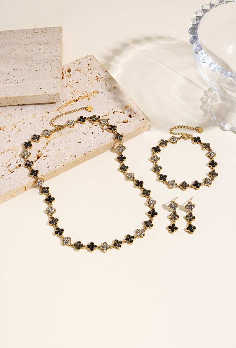 Grossiste WEC Bijoux - Parure Trèfles Scintillants en Acier Inoxydable Doré