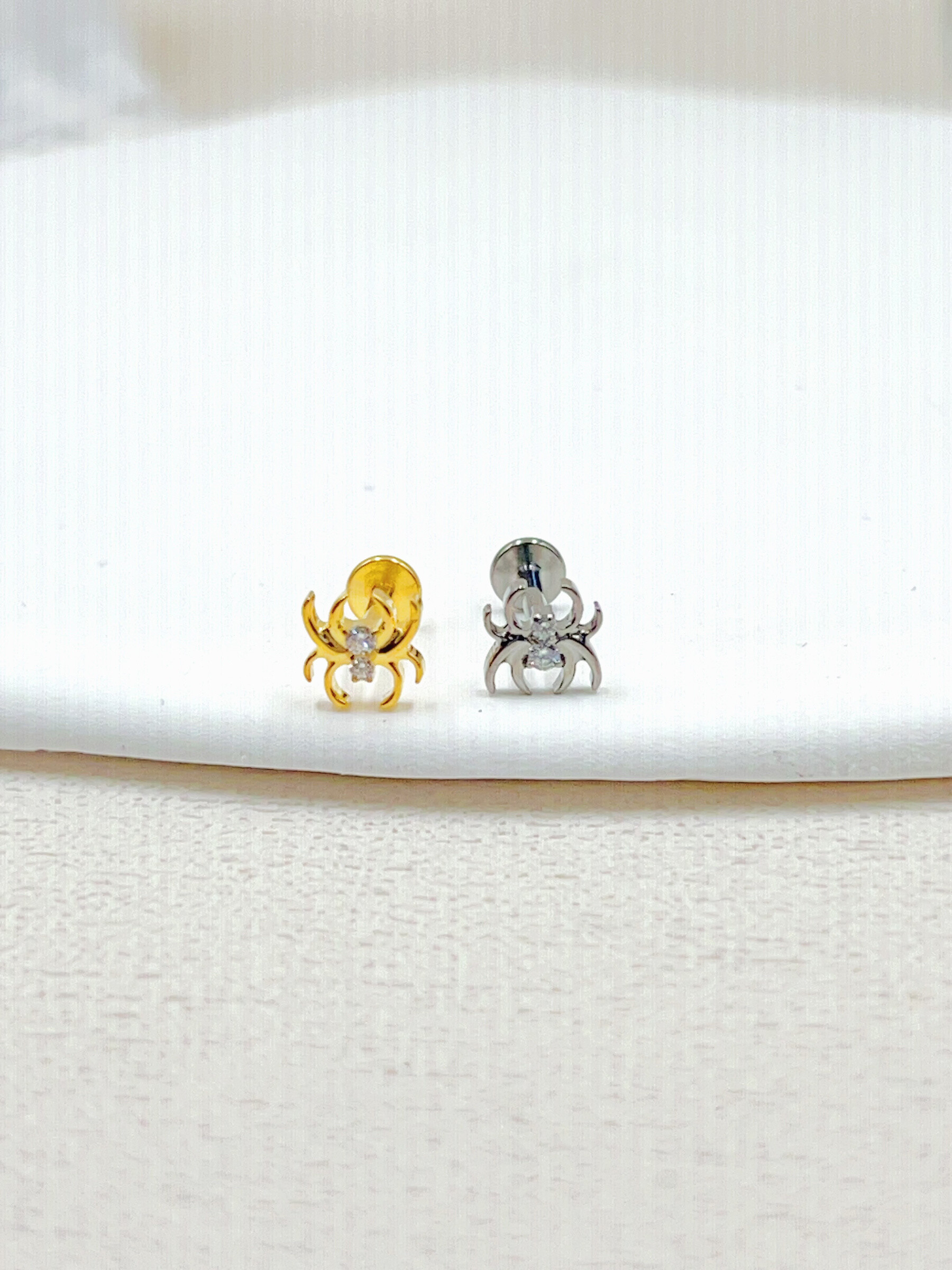 Grossista WEC Bijoux - Piercing in titanio, zirconio