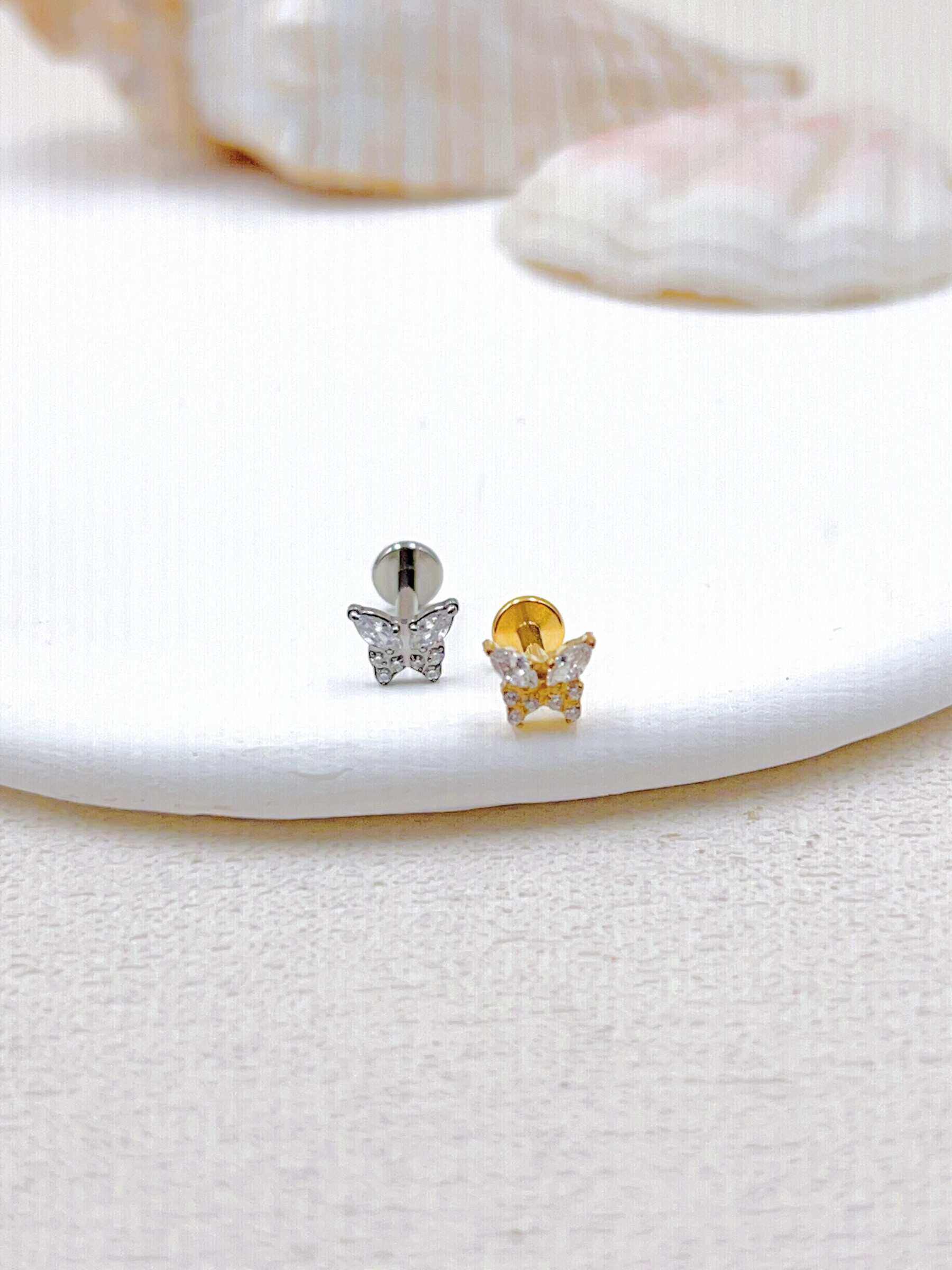 Grossista WEC Bijoux - Piercing in titanio, zirconio