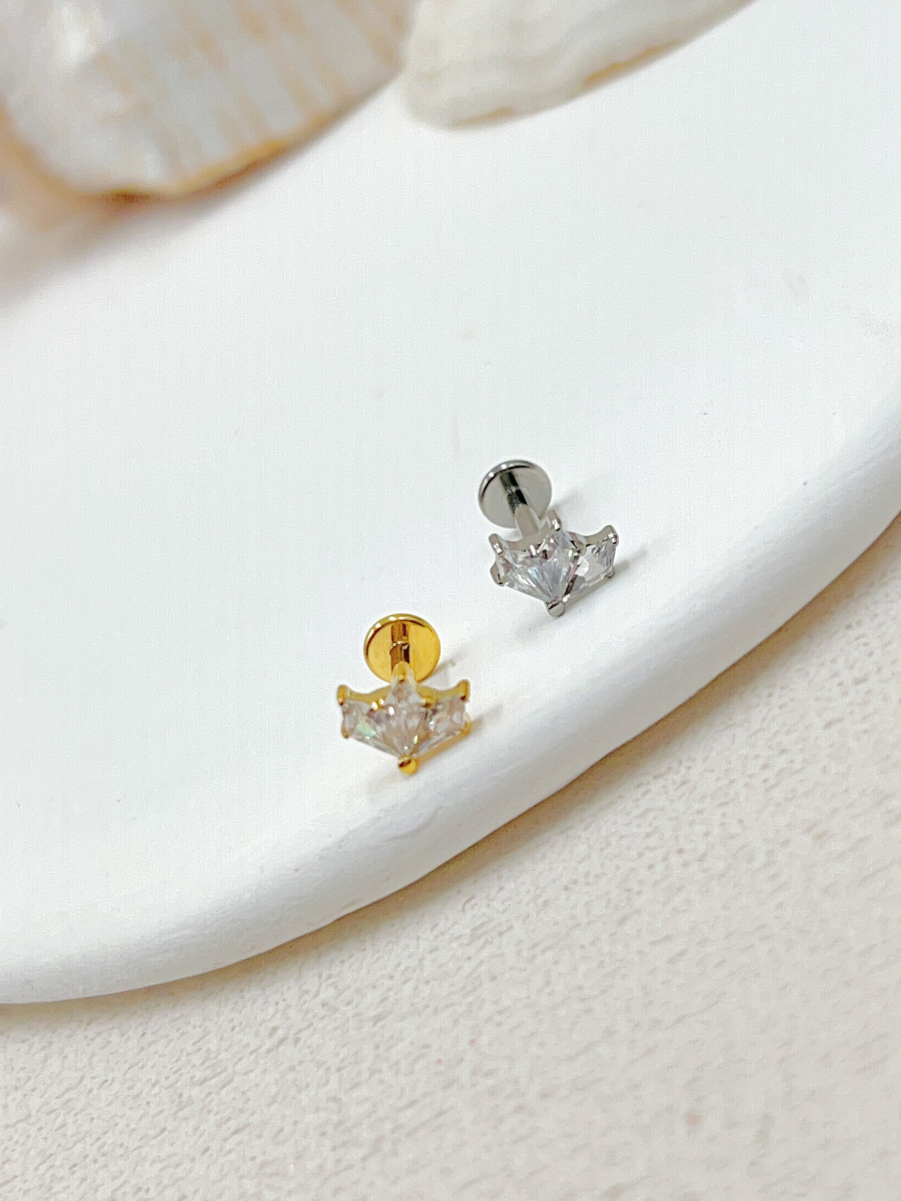 Grossista WEC Bijoux - Piercing in titanio, zirconio