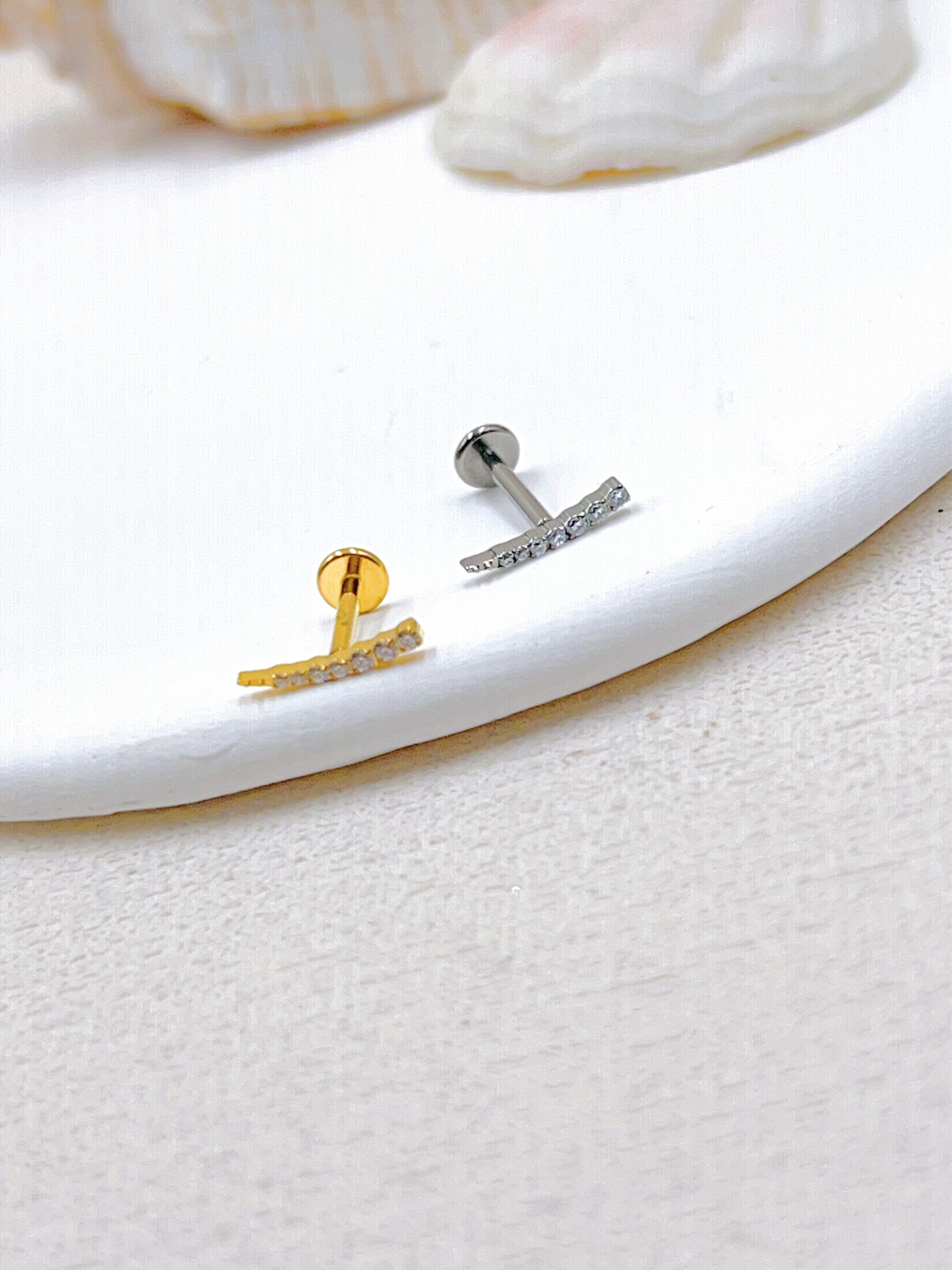 Grossista WEC Bijoux - Piercing in titanio, zirconio
