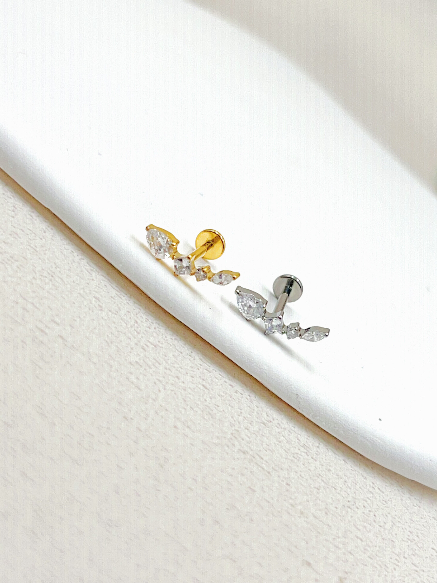 Grossista WEC Bijoux - Piercing in titanio, zirconio