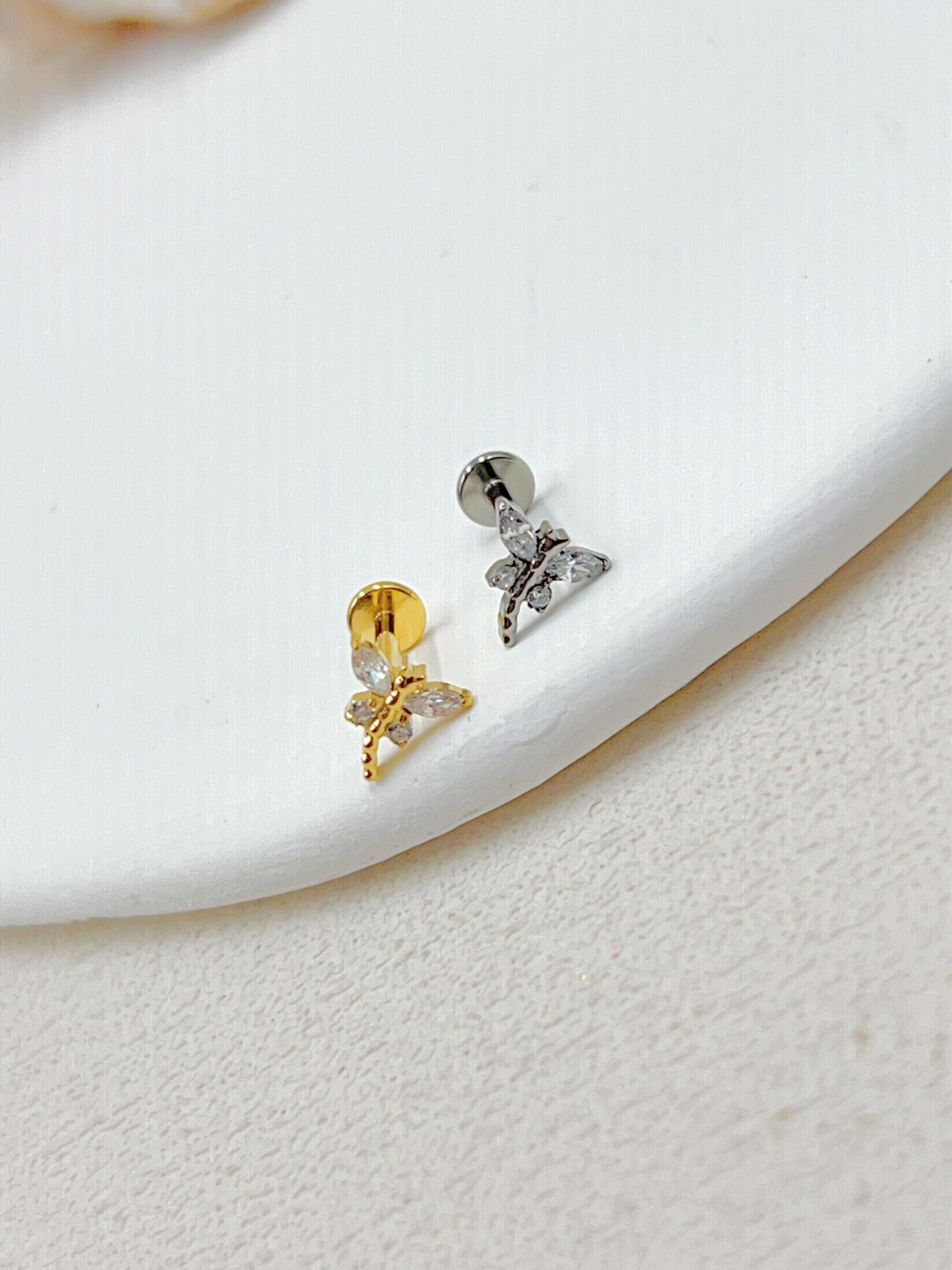 Grossista WEC Bijoux - Piercing in titanio, zirconio