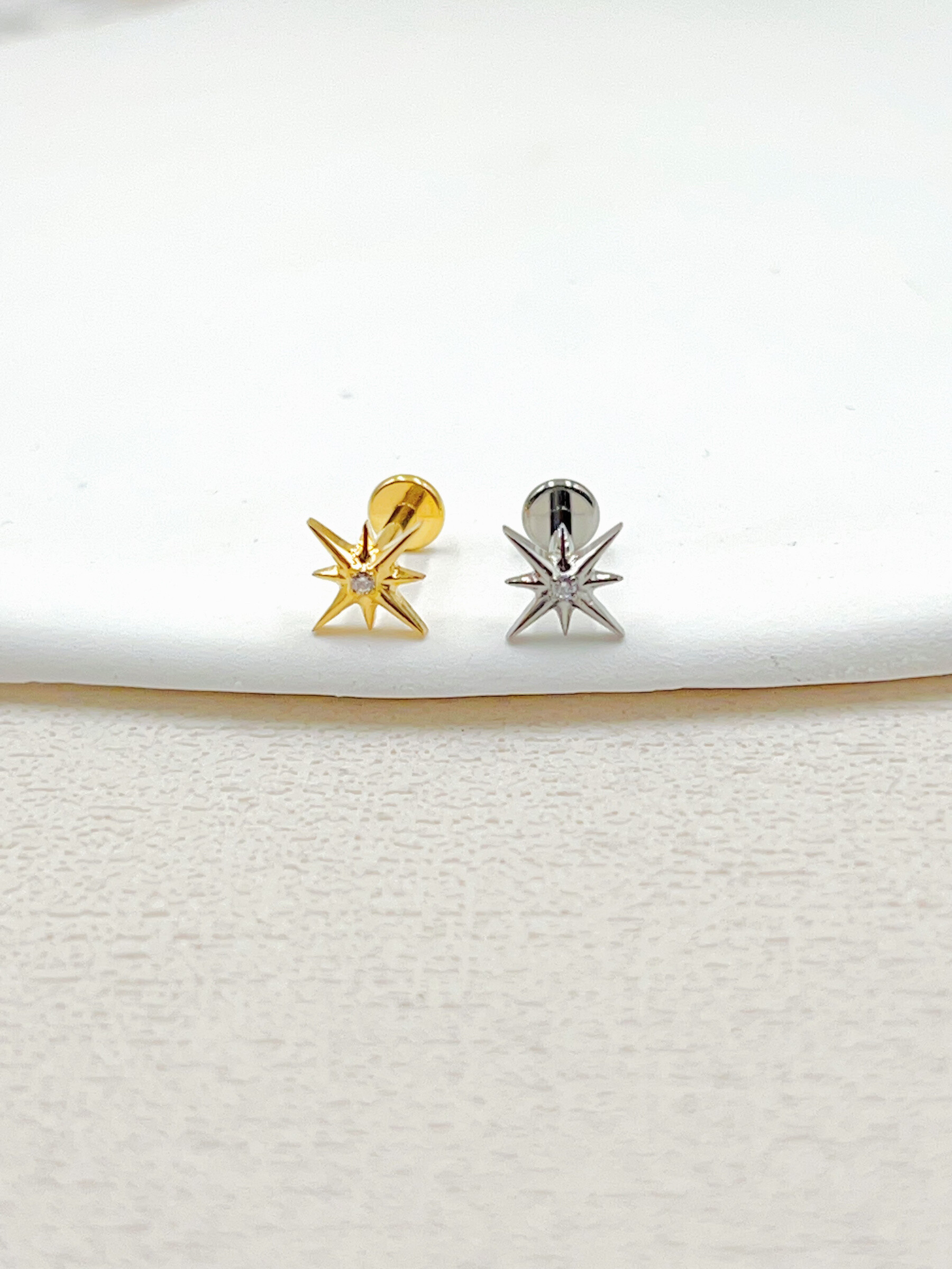 Grossista WEC Bijoux - Piercing in titanio, zirconio