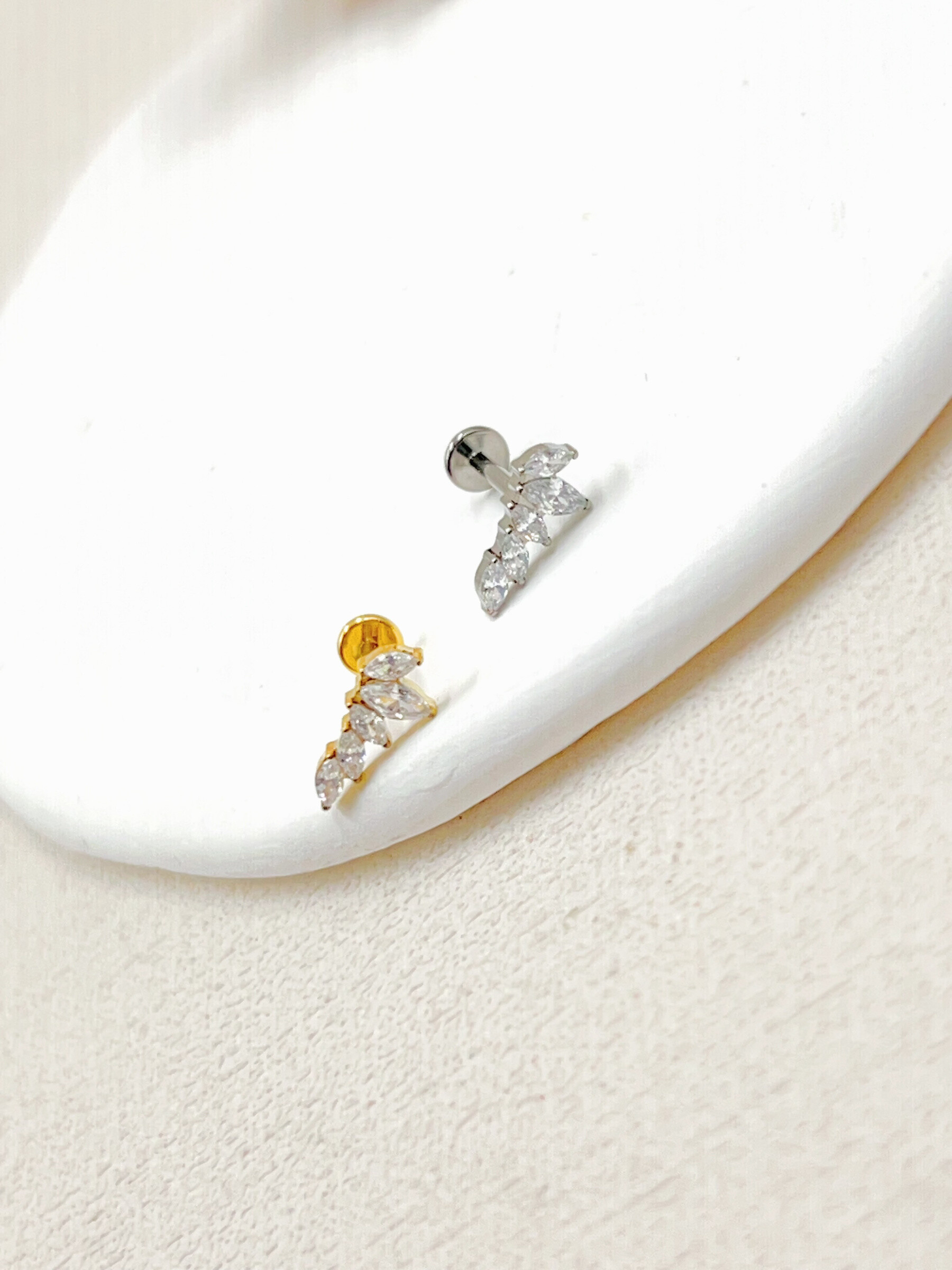 Grossista WEC Bijoux - Piercing in titanio, zirconio