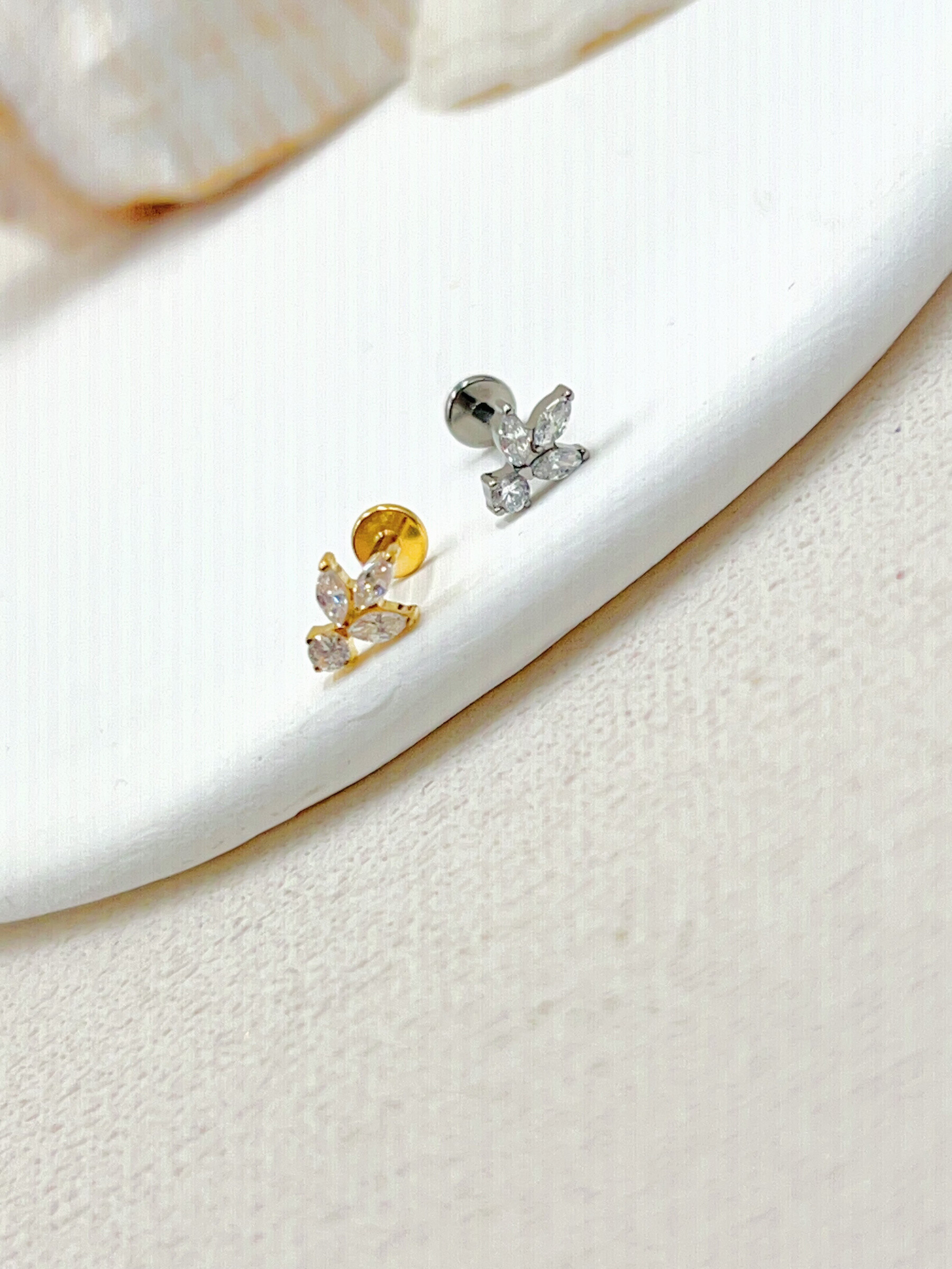 Grossista WEC Bijoux - Piercing in titanio, zirconio