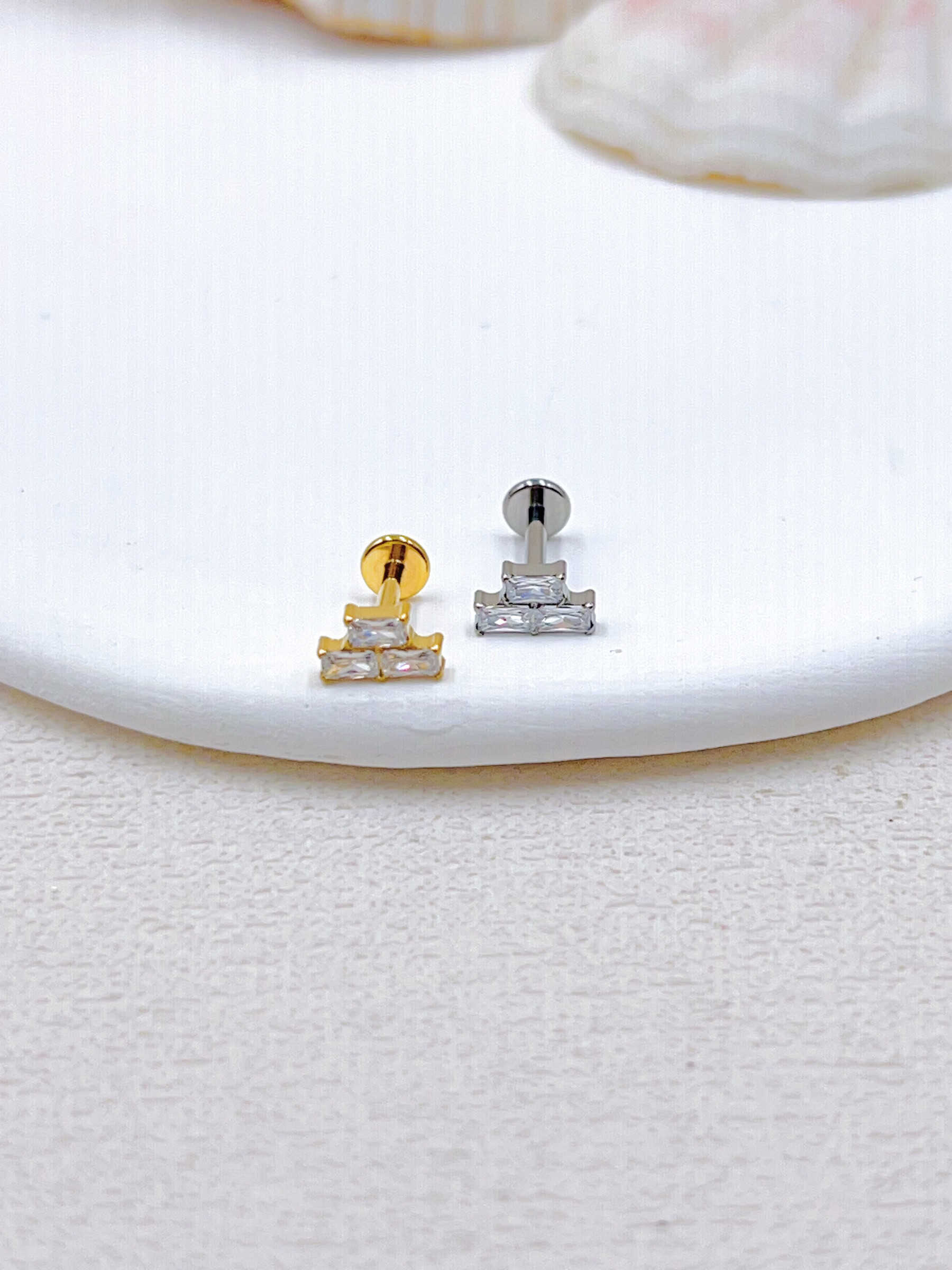 Grossista WEC Bijoux - Piercing in titanio, zirconio