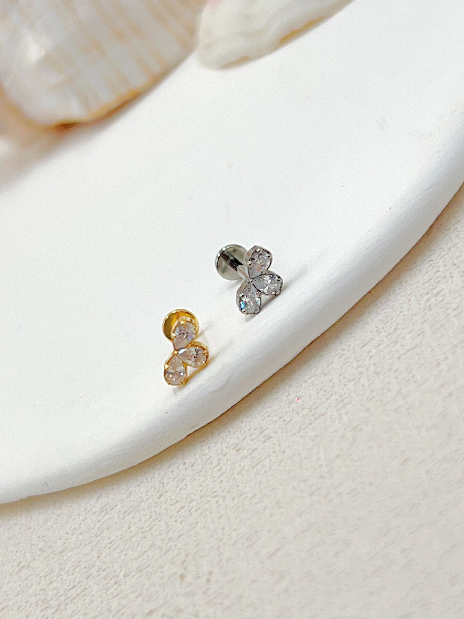 Grossista WEC Bijoux - Piercing in titanio, zirconio