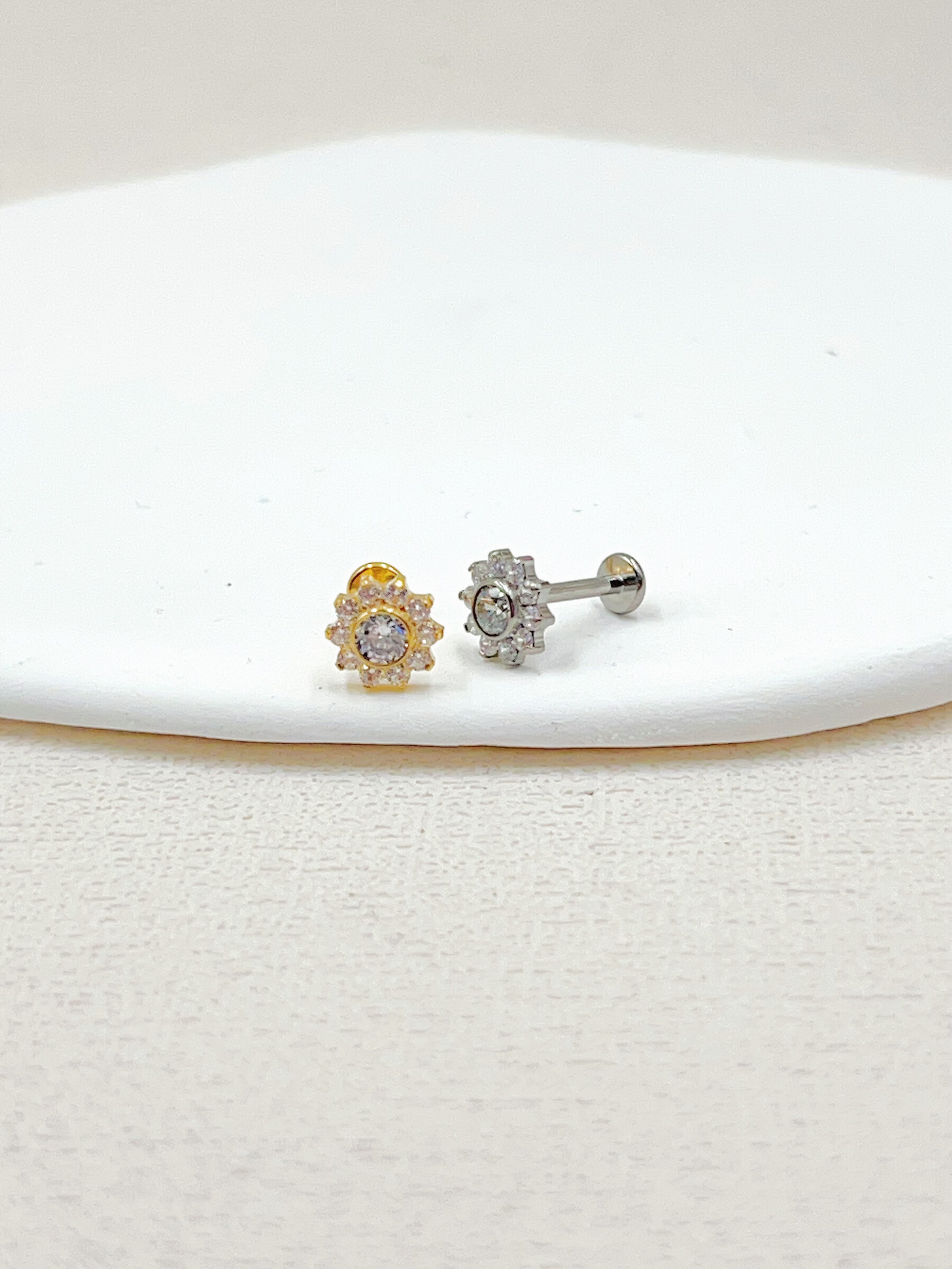 Grossista WEC Bijoux - Piercing in titanio, zirconio