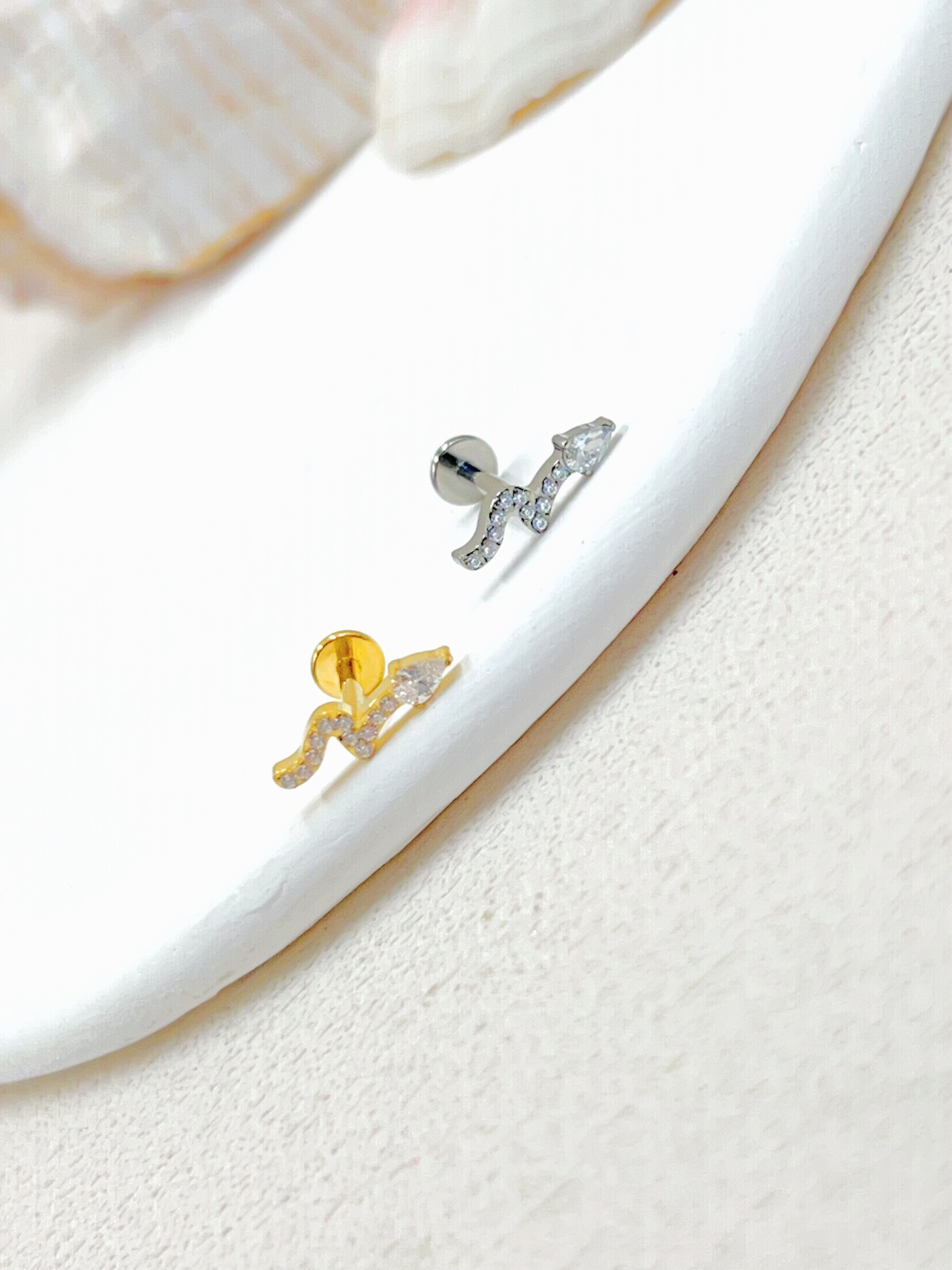 Grossista WEC Bijoux - Piercing in titanio, zirconio