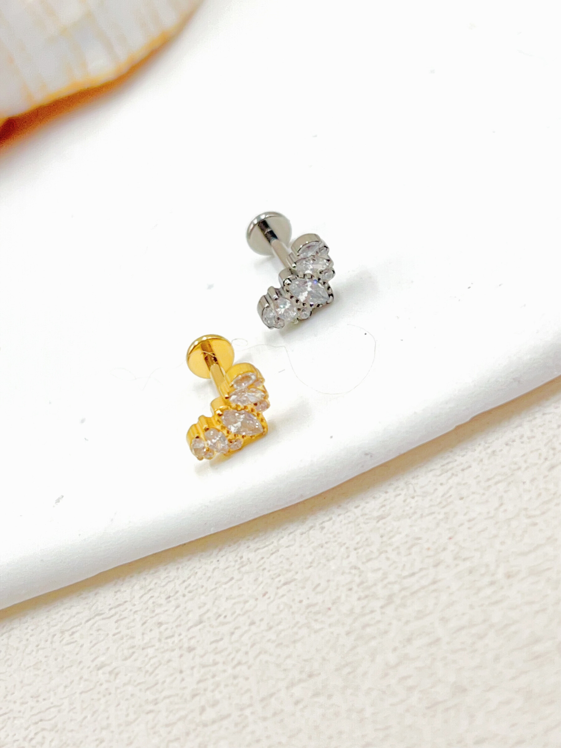 Grossista WEC Bijoux - Piercing in titanio, zirconio