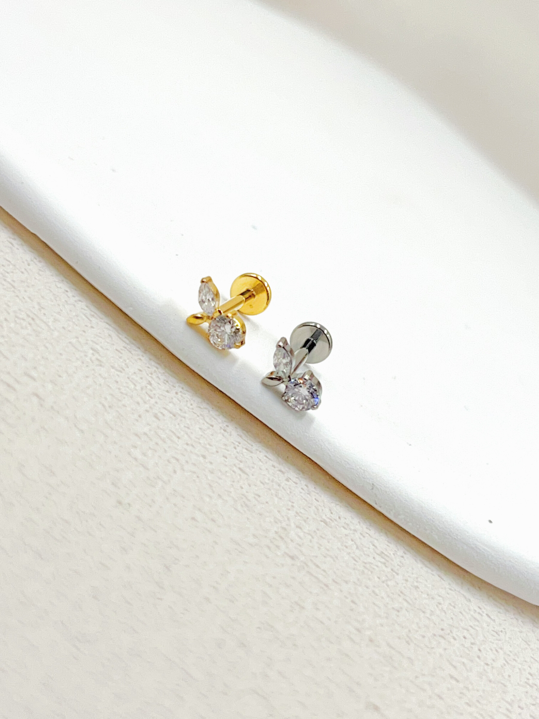 Grossista WEC Bijoux - Piercing in titanio, zirconio