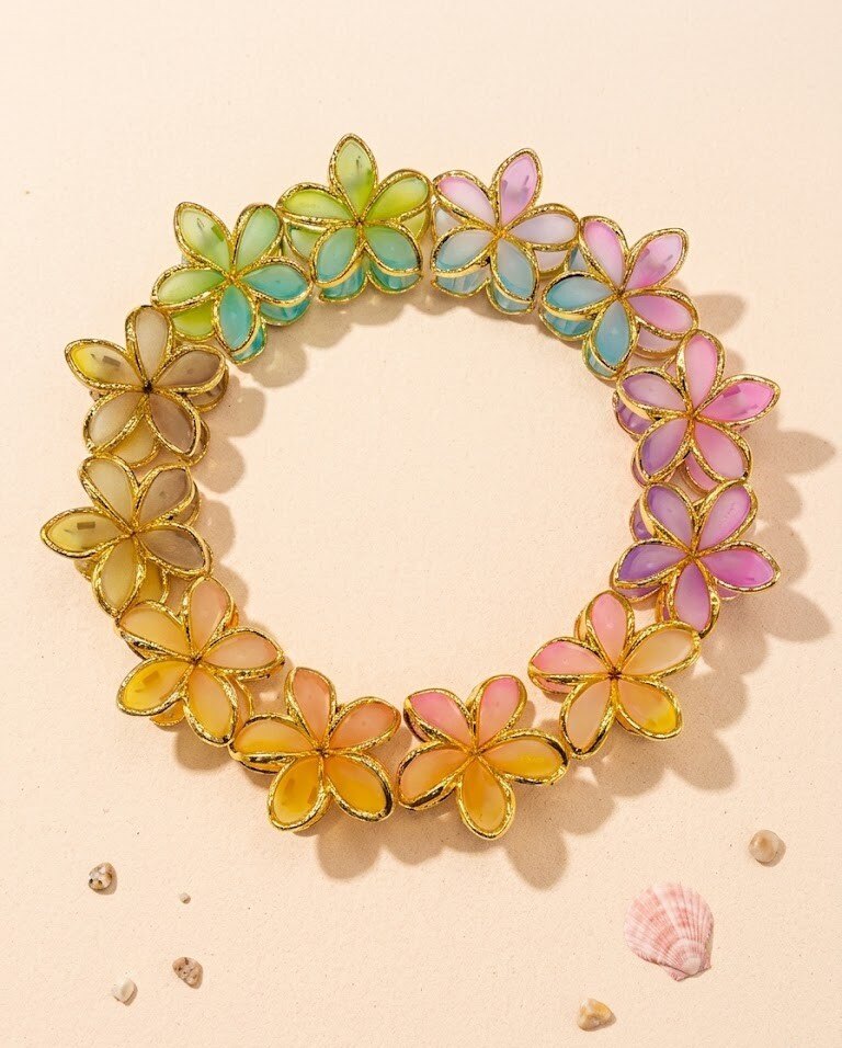 Grossiste WEC - Lot 12 de Pinces à Cheveux Fleurs de Frangipanier – Éclat Tropical