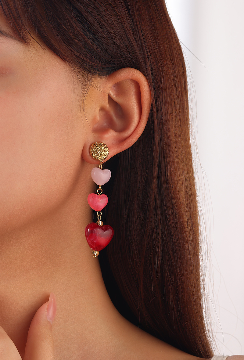 Grossiste WEC Bijoux - Boucles d'Oreilles "Trio de Cœurs" – Acier Inoxydable Doré