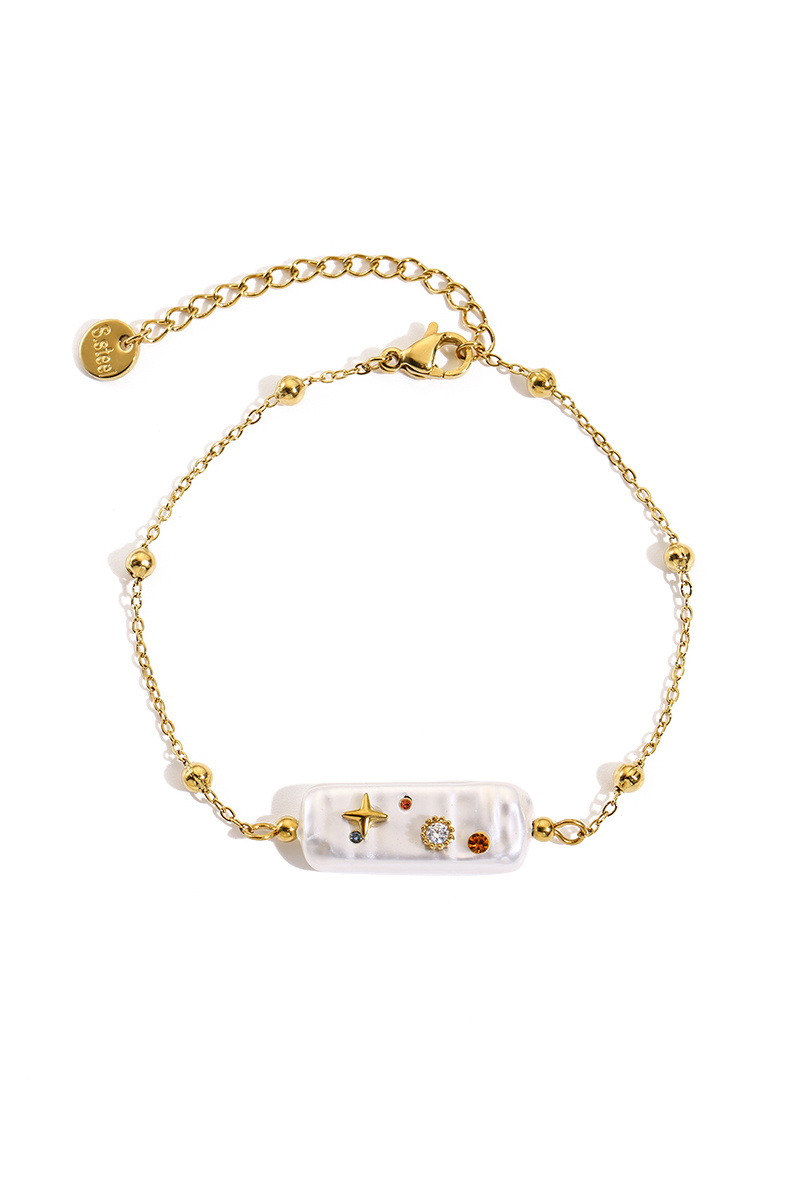 Grossiste WEC Bijoux - Bracelet Cosmos en Acier Doré et Perle Nacre