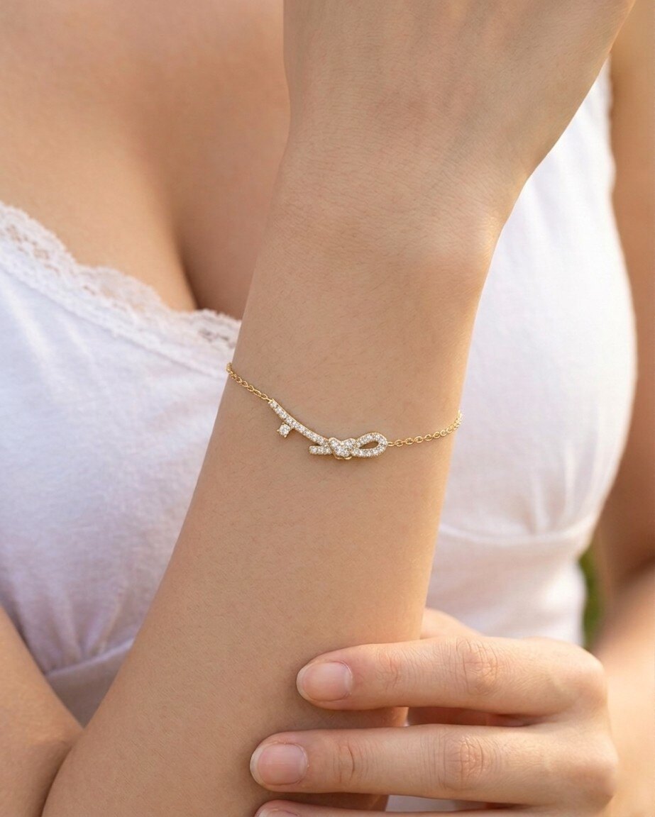 Grossiste WEC Bijoux - Bracelet Nœud Étincelant en Acier Inoxydable Doré