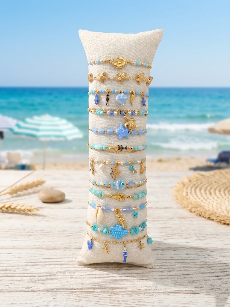 Grossiste WEC - LOT DE 12 BRACELETS EN ACIER INOXYDABLE +BOUDIN -Collection Trésors de l'Océan
