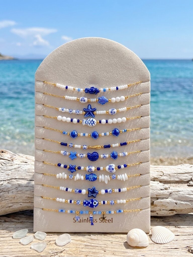 Grossiste WEC - LOT DE 12 COLLIERS EN ACIER INOXYDABLE + PRESENTOIR - Collection Océan Bleu & Porcelaine – Éclat Marin