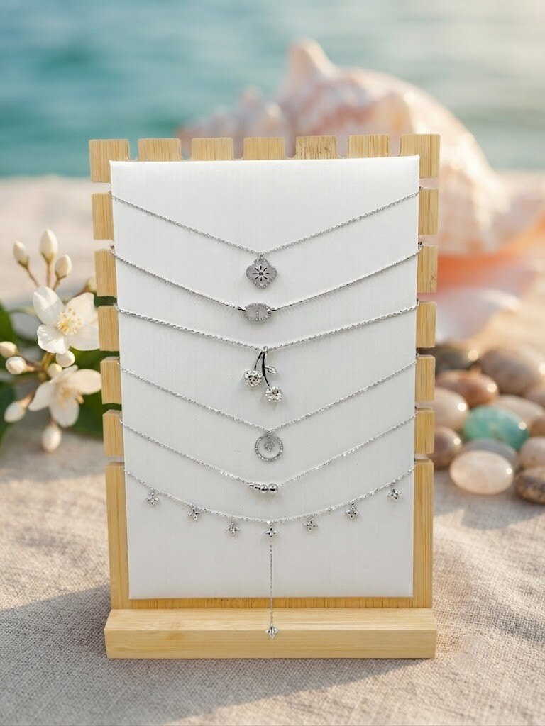 Grossista WEC Bijoux - Set di 6 collane in acciaio inossidabile + espositore