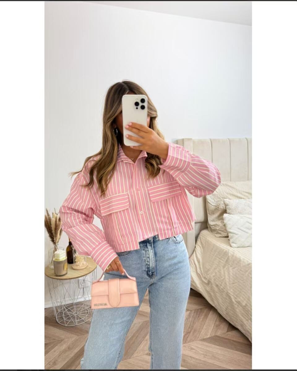 Light striped shirt, 100% polyester, ideal for summer. Made in Italy for an elegant touch in spring.