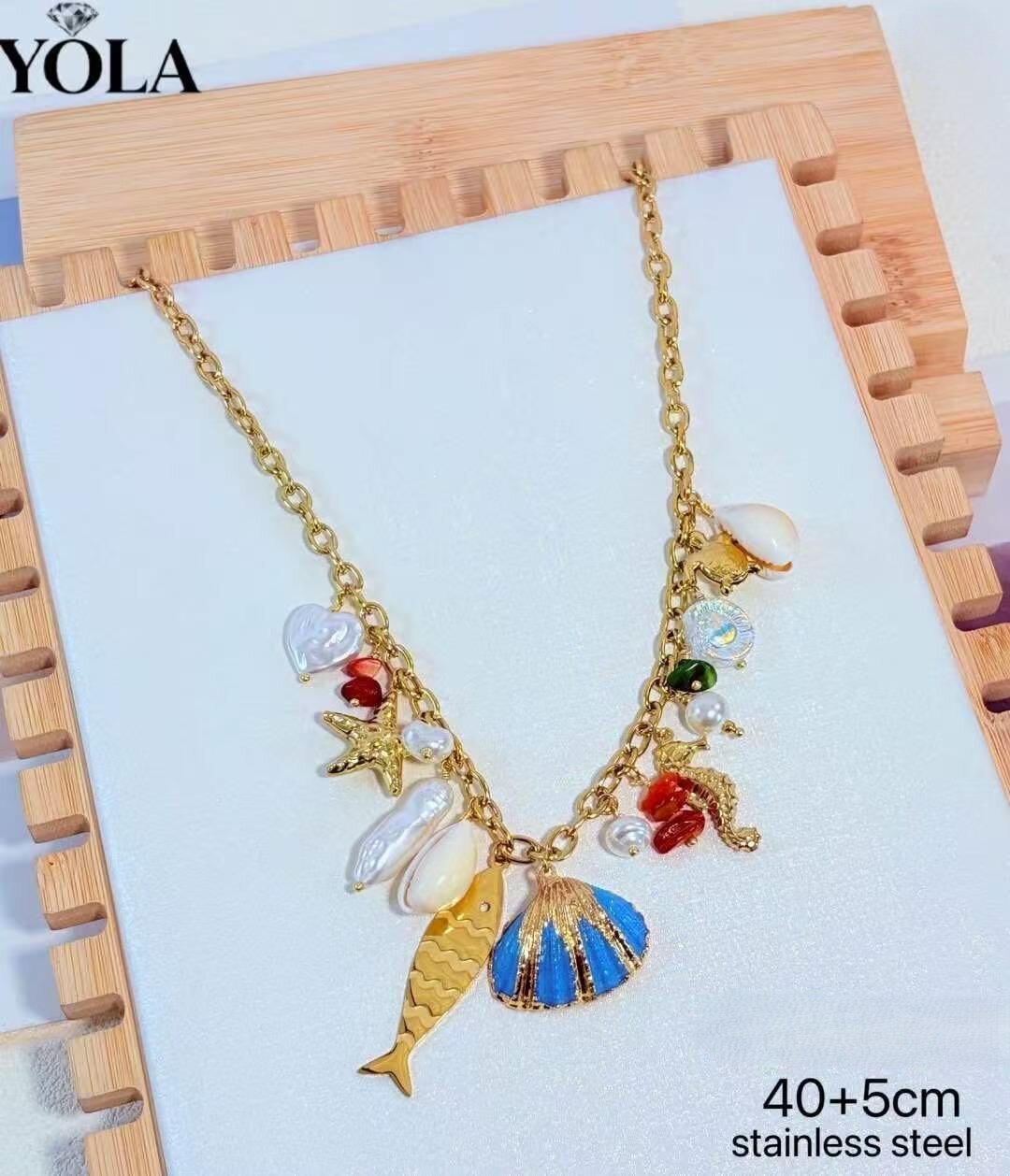Wholesaler YOLA BIJOUX - NECKLACE in stainless steel with an elegant design rich in details