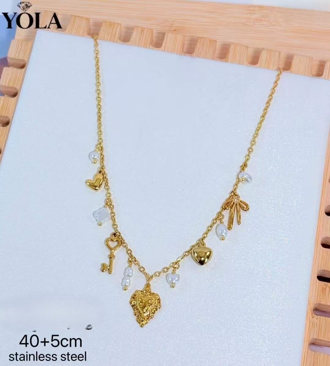 Wholesaler YOLA BIJOUX - STEEL NECKLACE WITH SMALL DECORATIONS AND PEARL