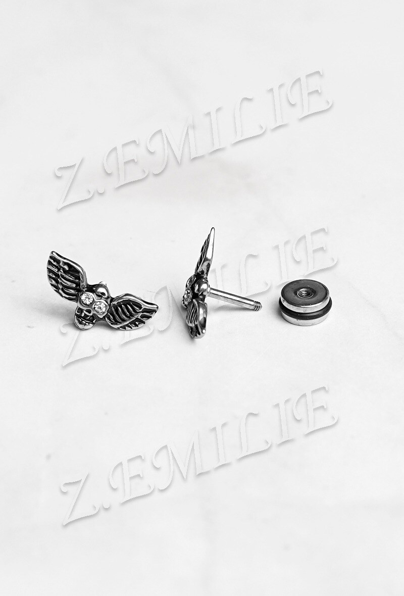 Grossiste Z. Emilie - Faux élargisseur tête de mort ailes boucle d'oreille