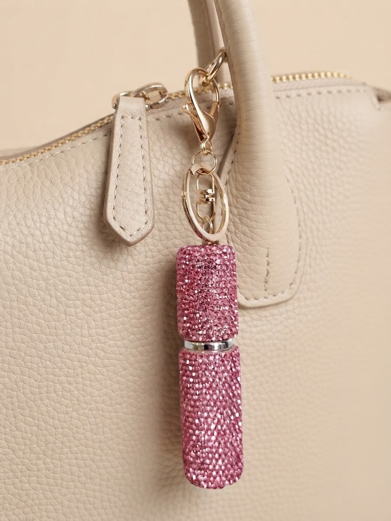 Wholesaler I.L JOLI B - Multicolored perfume bottle keychain in whimsical design