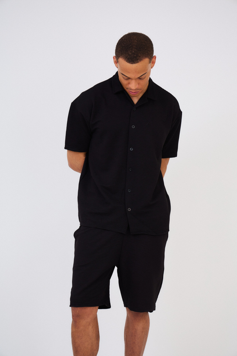 Grossista Aarhon - Set di pantaloncini e camicia a pieghe