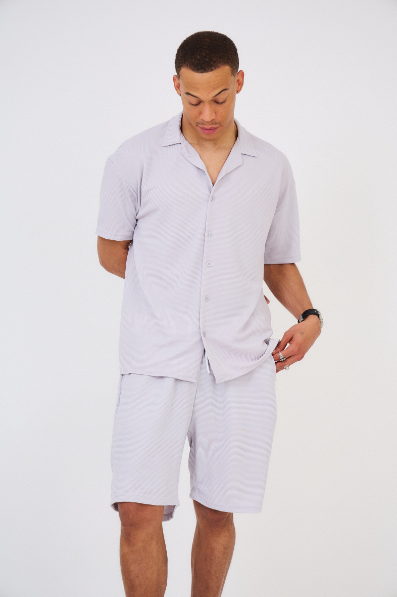 Grossista Aarhon - Set di pantaloncini e camicia a pieghe