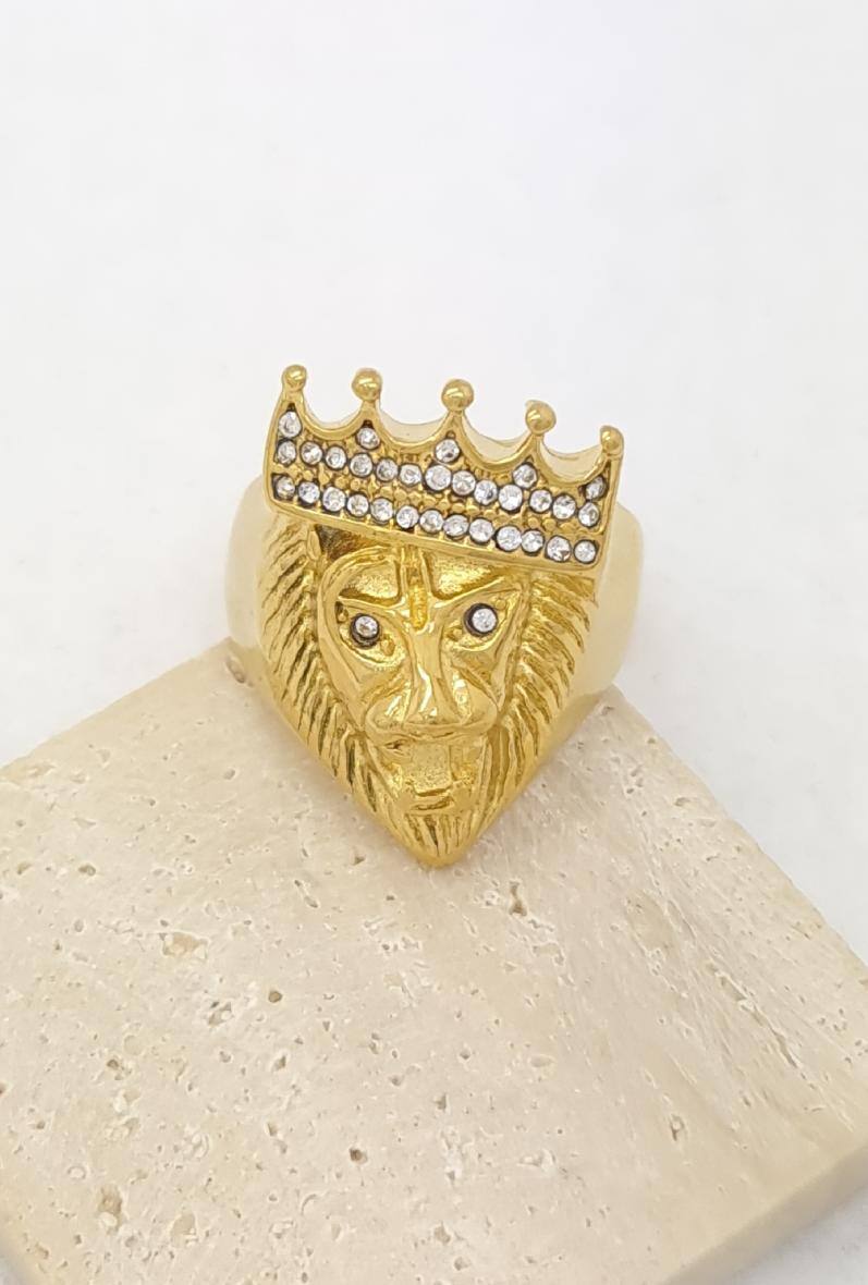 Grossista Bijoussimo - Anello in acciaio dorato da uomo con testa di leone e strass