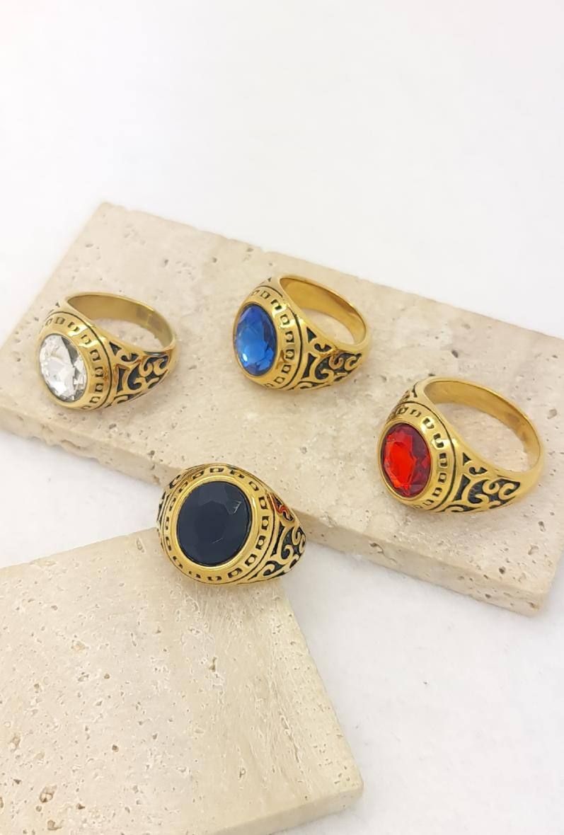 Grossista Bijoussimo - Anello in acciaio dorato da uomo con pietra colorata (M02)