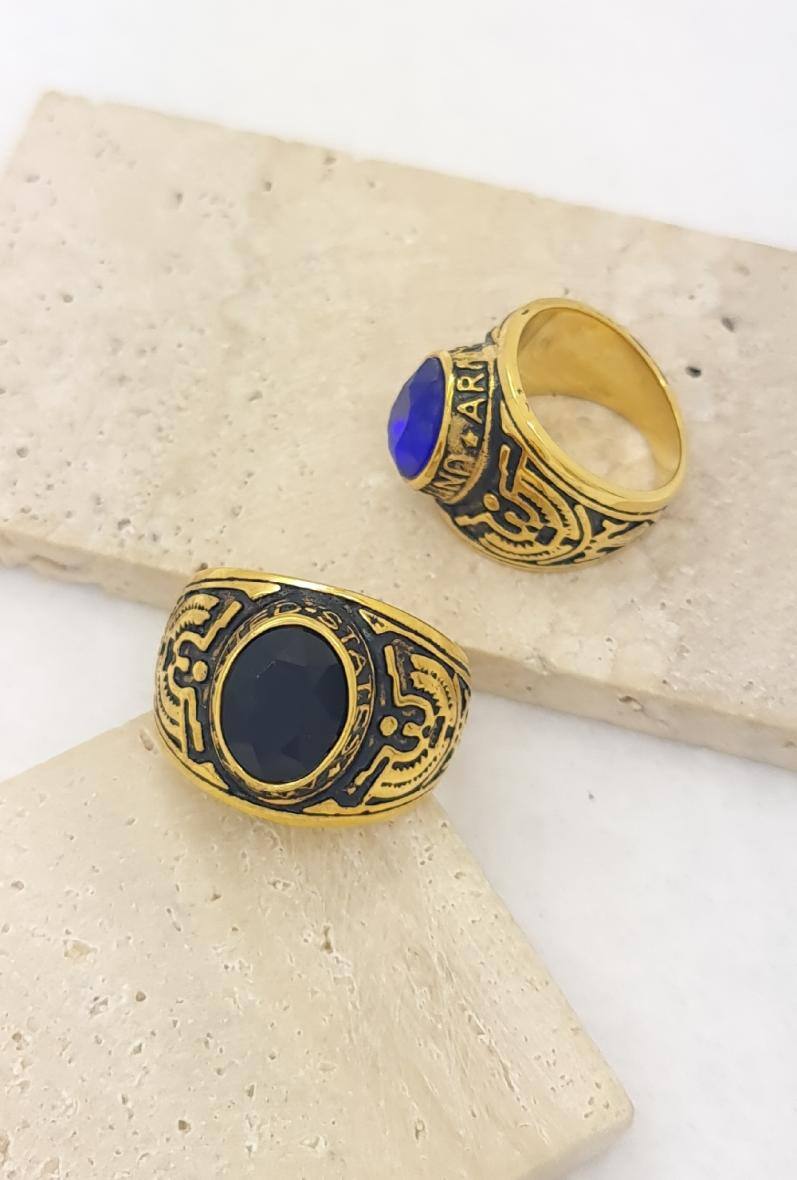 Grossista Bijoussimo - Anello in acciaio dorato da uomo con pietra colorata