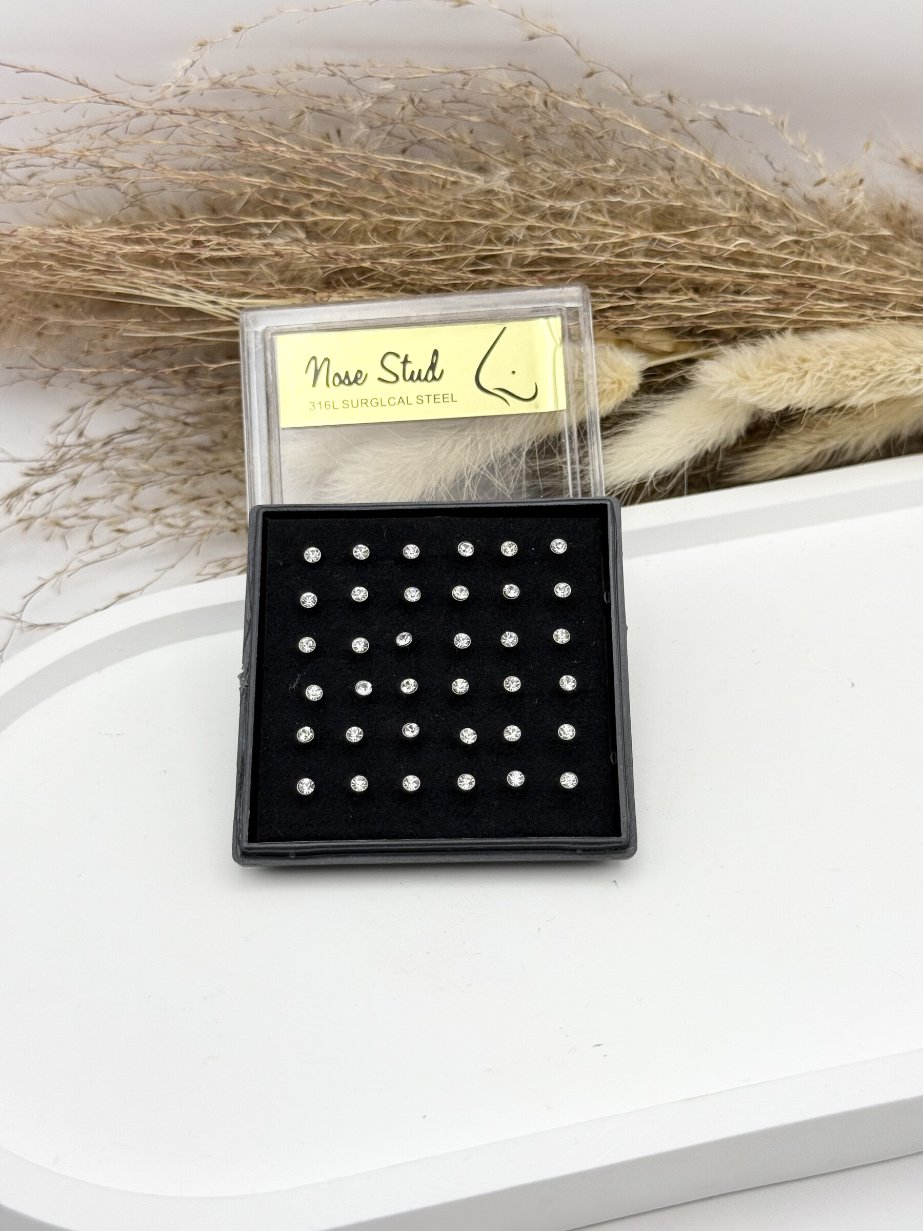 Grossiste Ceramik - Boîte de 36 Piercings de Nez petit boule Acier Inoxydable, Tige 9mm stras