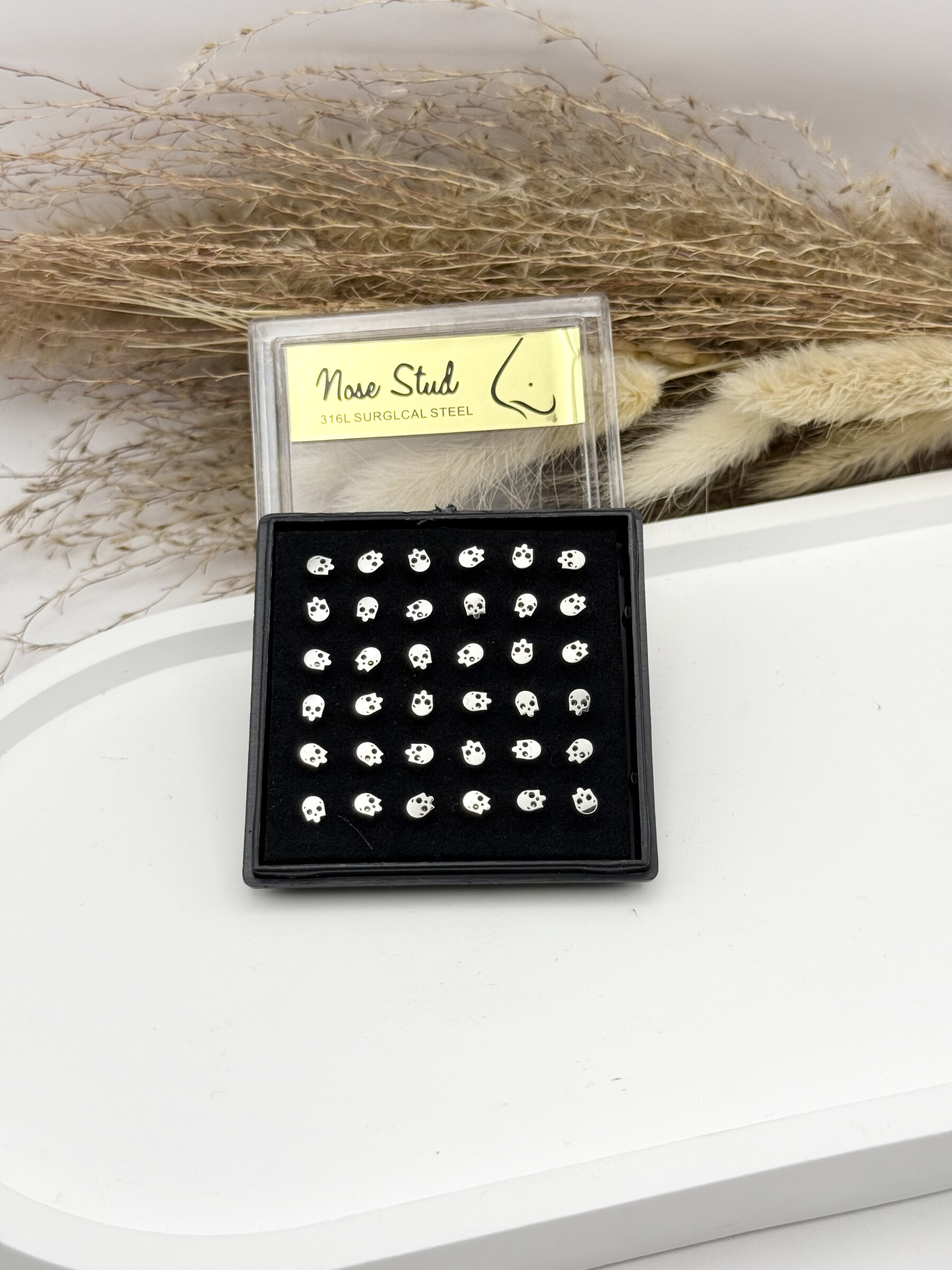 Grossiste Ceramik - Boîte de 36 Piercings de Nez petit boule Acier Inoxydable, Tige 9mm crane