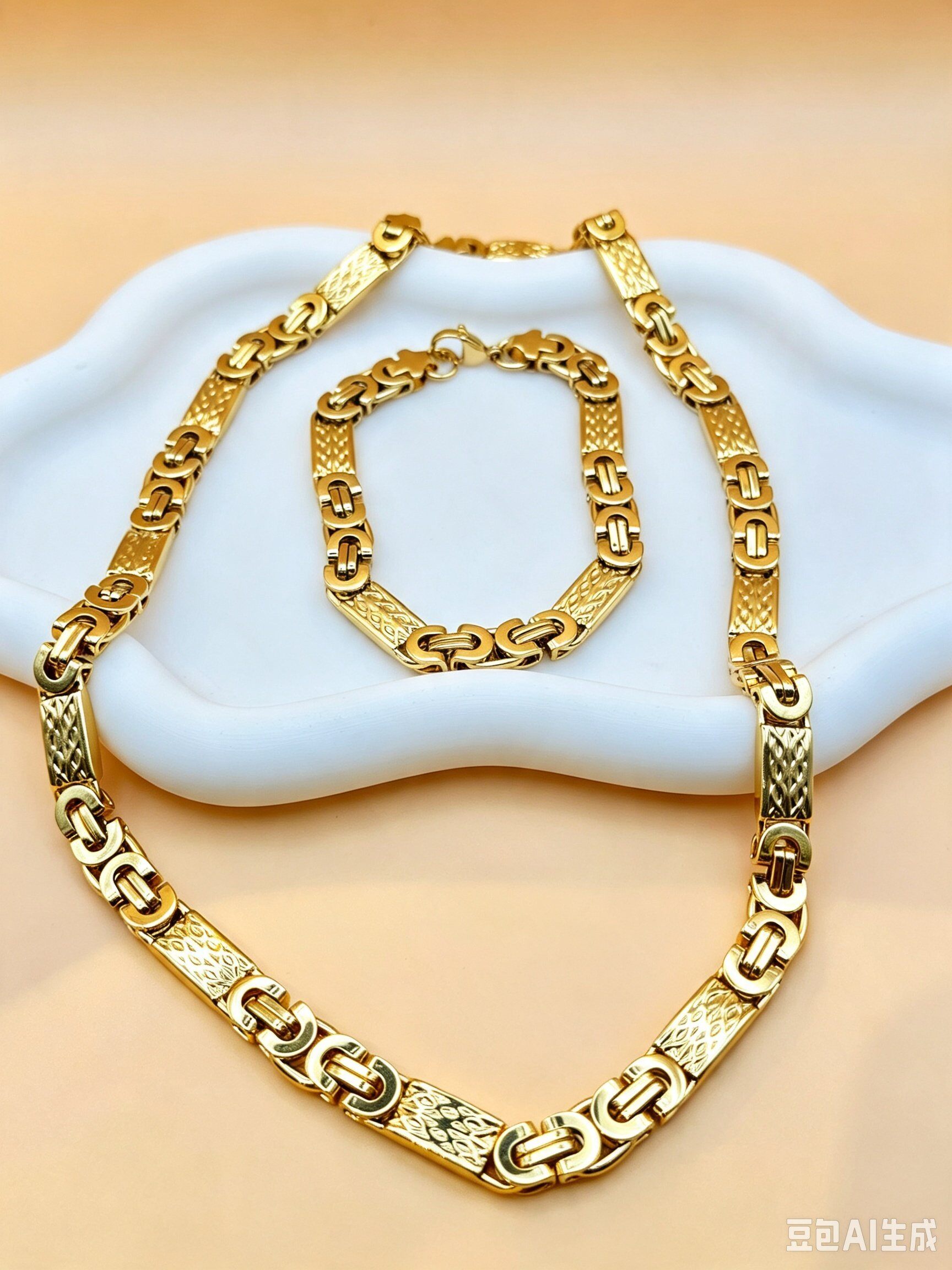 Grossista Ceramik - Set collana e bracciale uomo in acciaio dorato