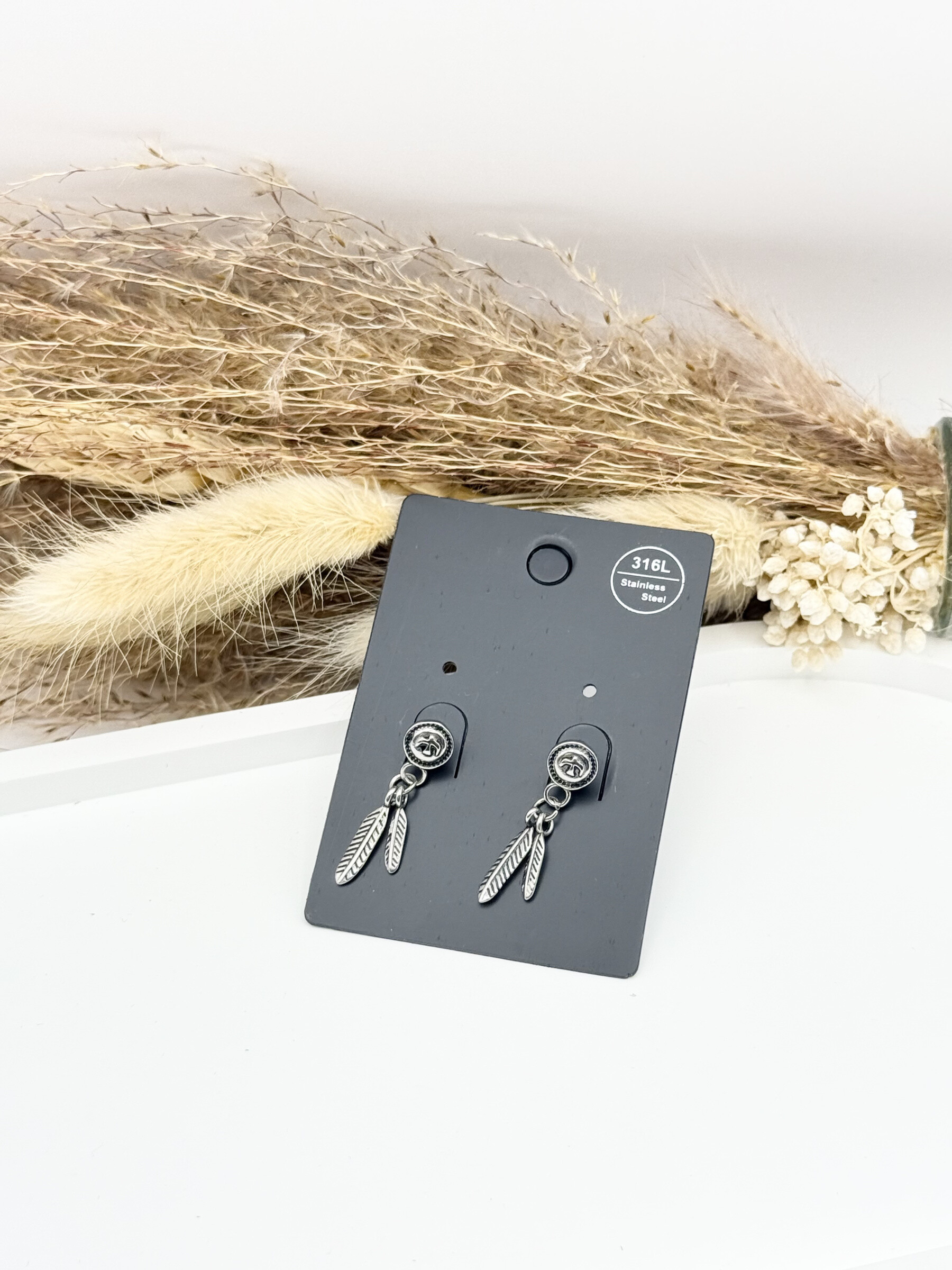 Wholesaler Ceramik - 316L stainless steel earrings/piercings with screw closure